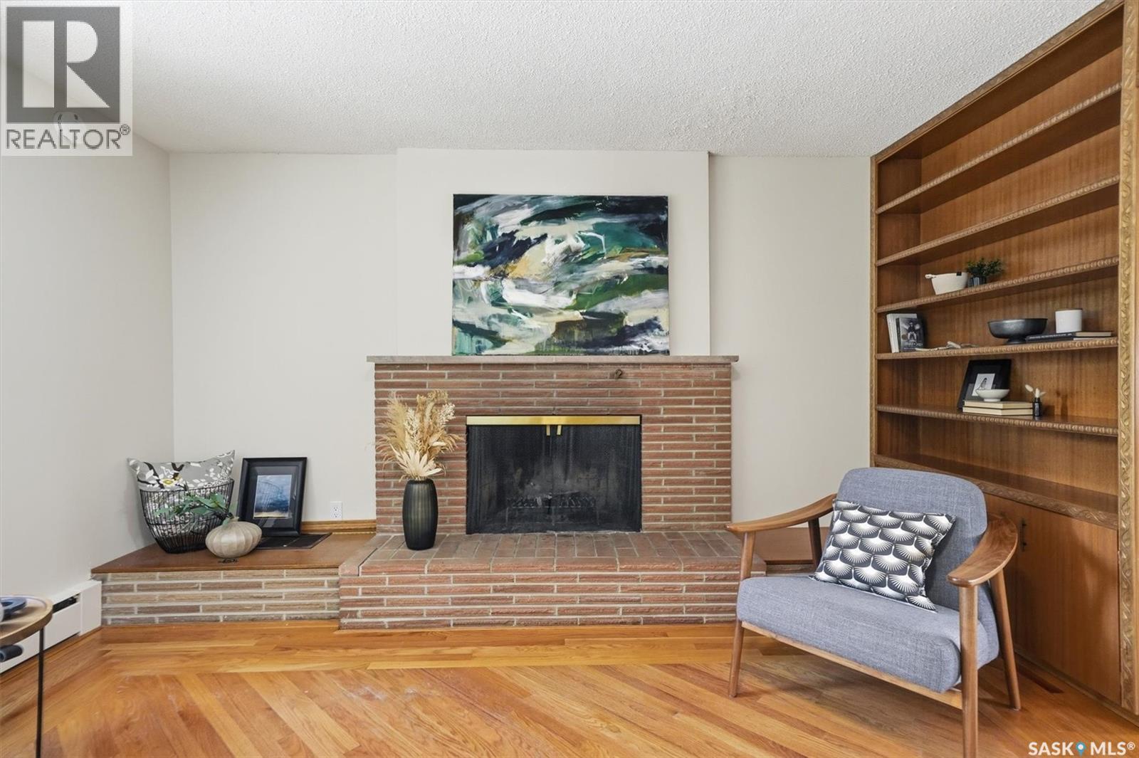 2020 Eastlake Avenue, Saskatoon, SK - Indoor Photo Showing Living Room With Fireplace