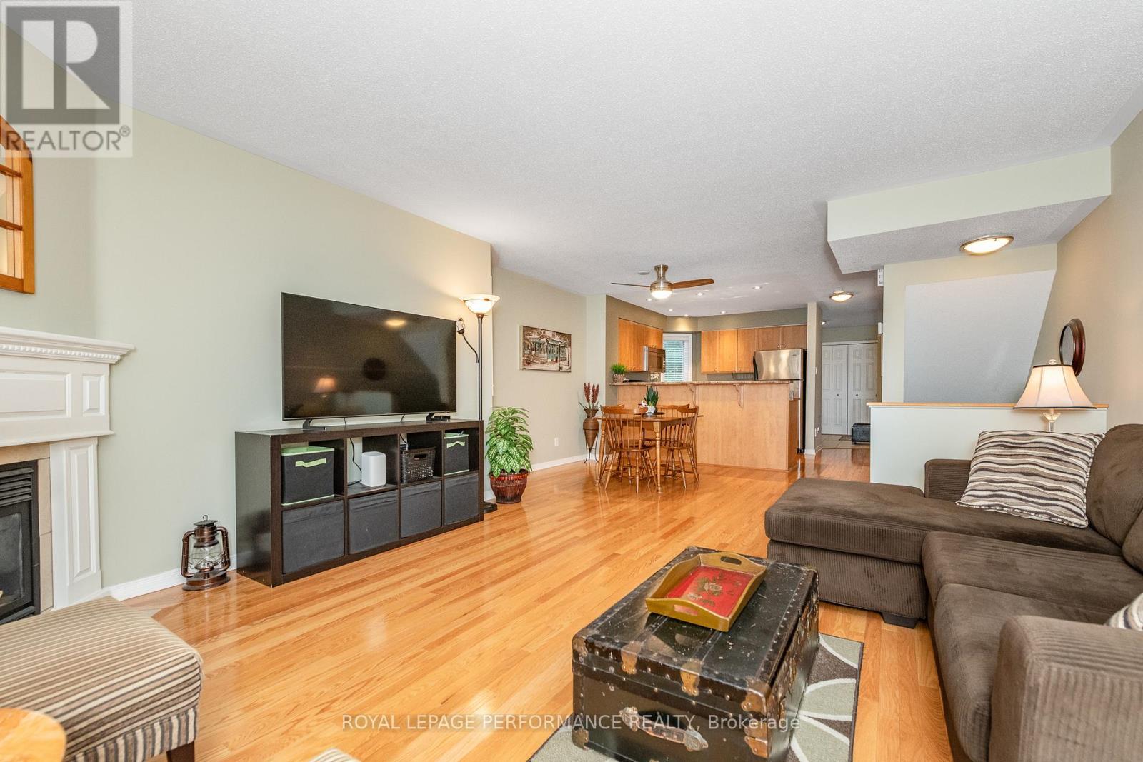 111 Steele Park Private, Ottawa, ON - Indoor Photo Showing Living Room With Fireplace