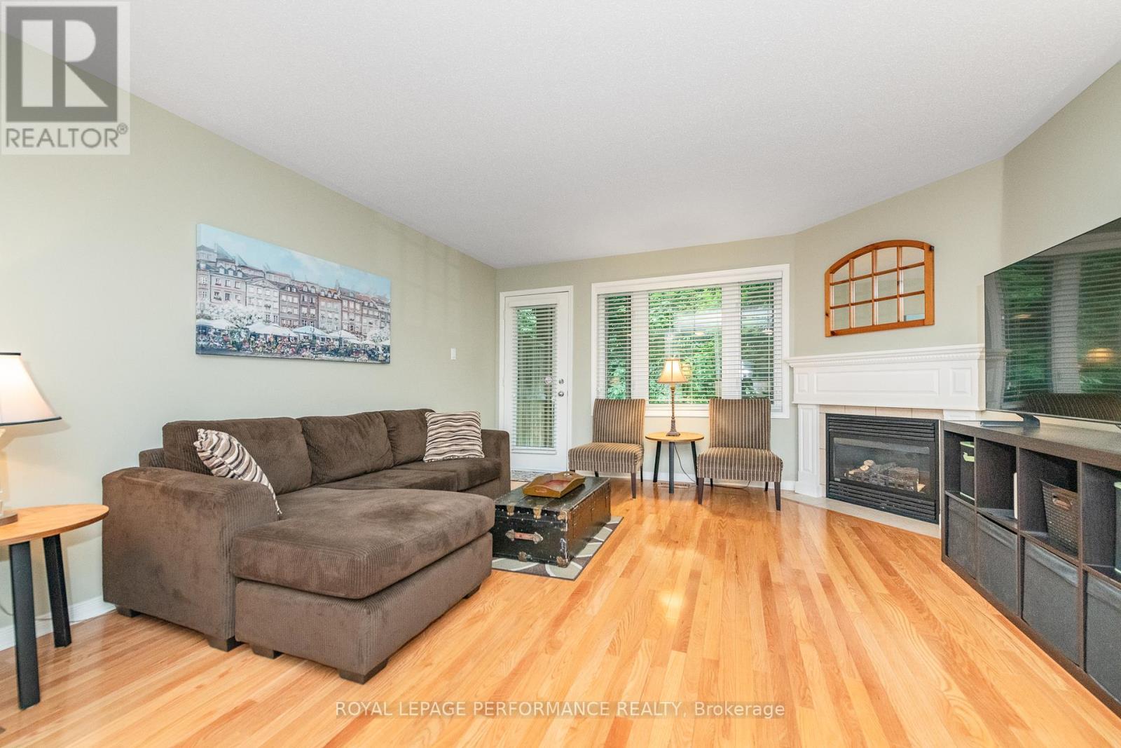 111 Steele Park Private, Ottawa, ON - Indoor Photo Showing Living Room With Fireplace