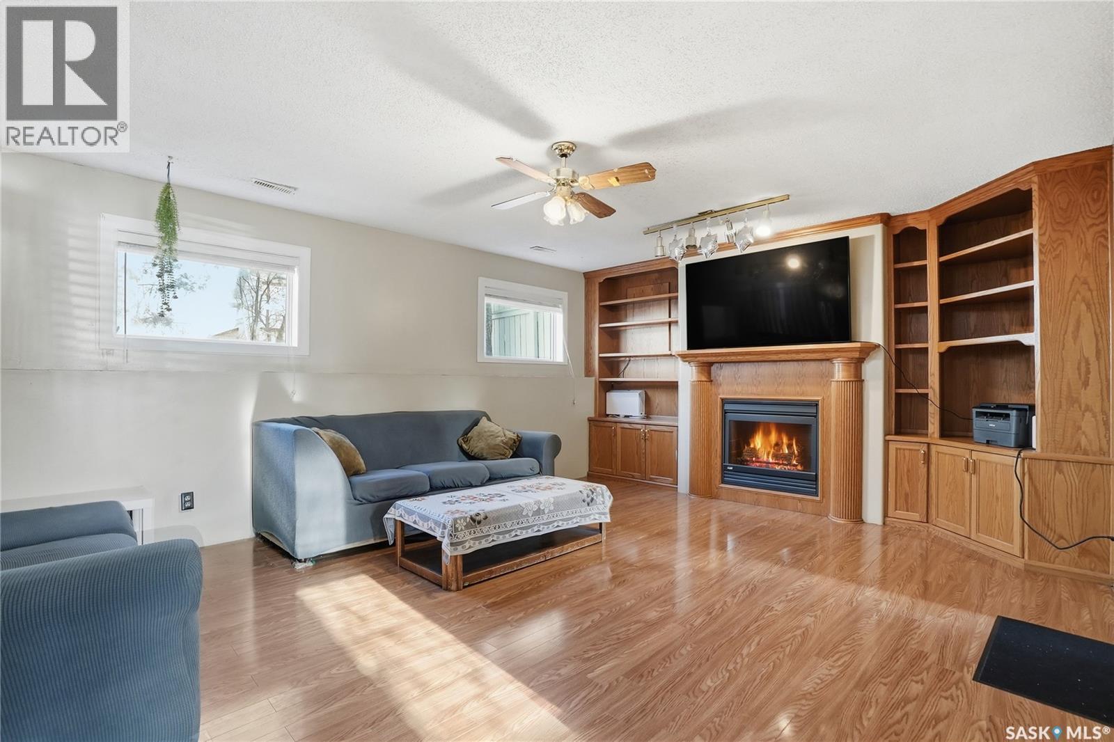 454 Konihowski Road, Saskatoon, SK - Indoor Photo Showing Living Room With Fireplace
