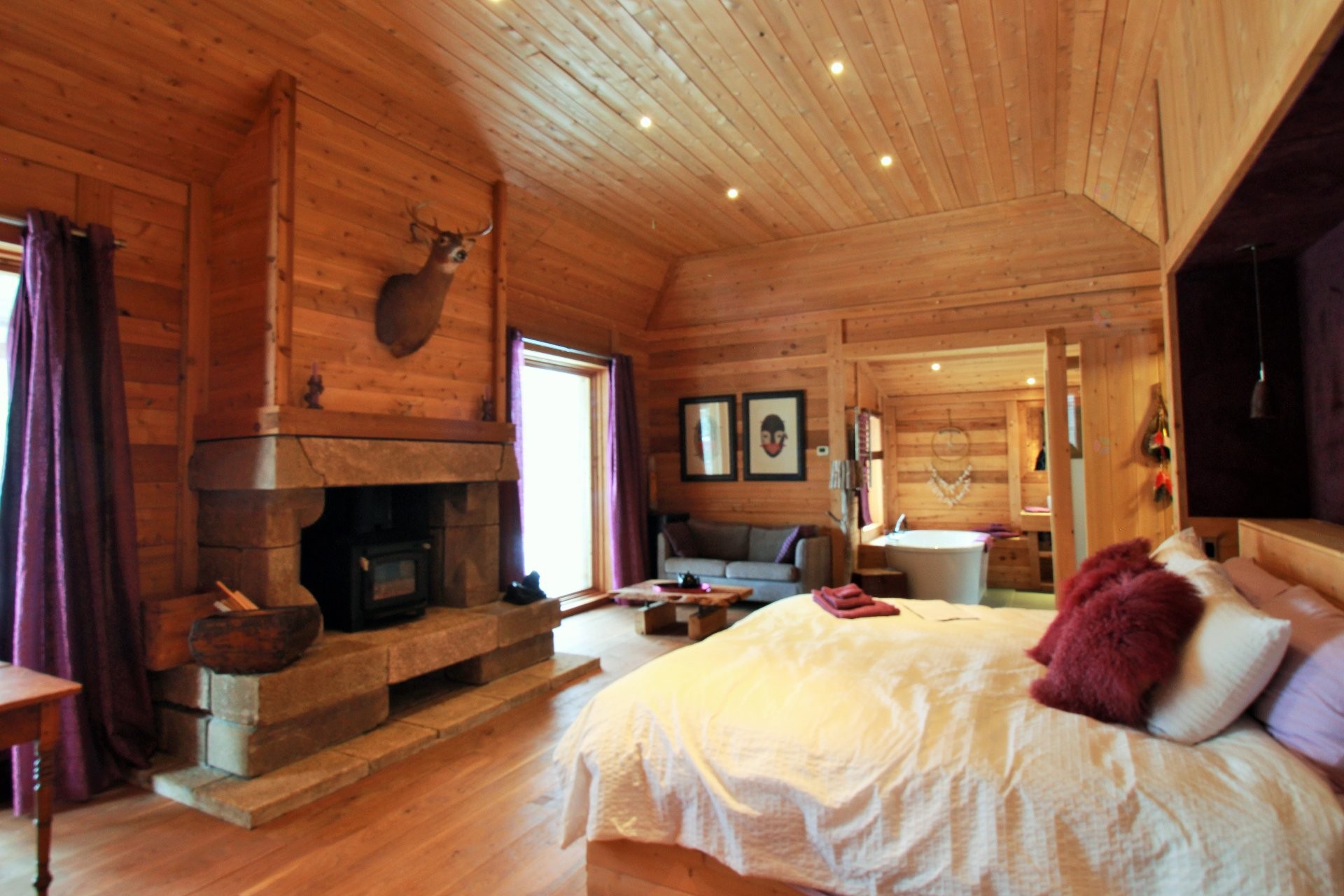 Overall view - 960 Rg Ste-Mathilde O., La Malbaie, QC - Indoor Photo Showing Bedroom With Fireplace