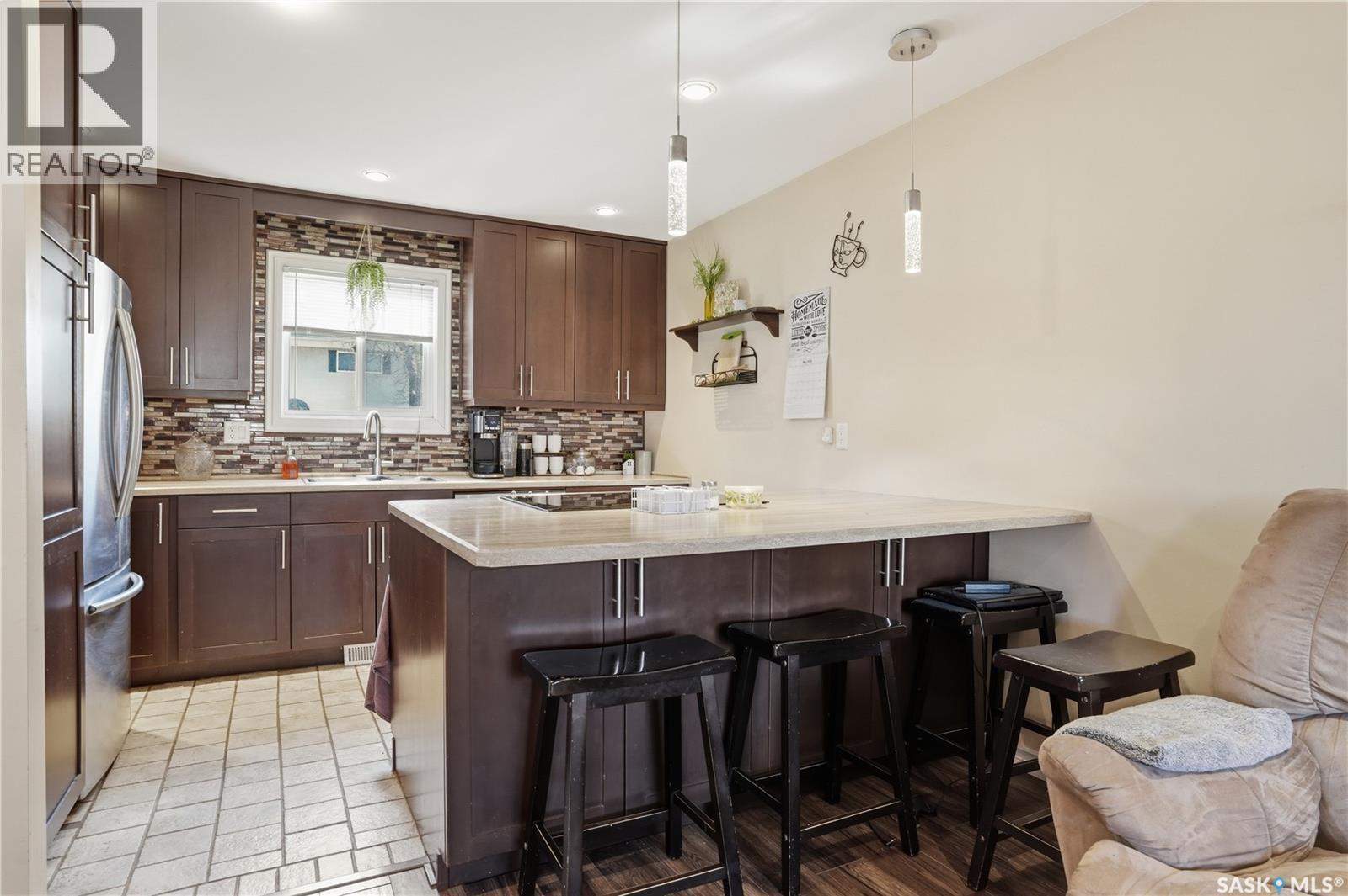 7 Killarney Way, Regina, SK - Indoor Photo Showing Kitchen With Upgraded Kitchen