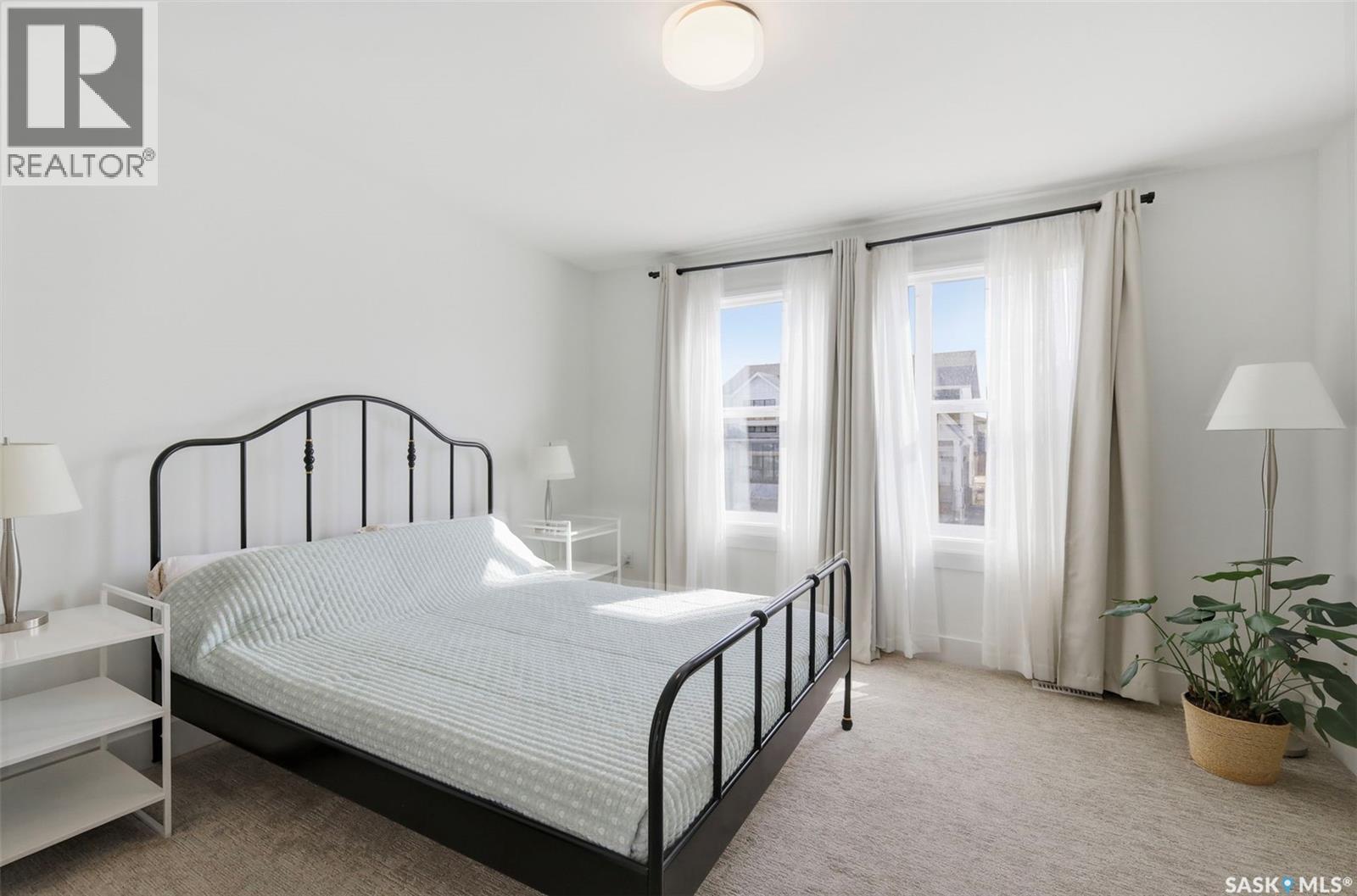 165 Rosewood Boulevard E, Saskatoon, SK - Indoor Photo Showing Bedroom