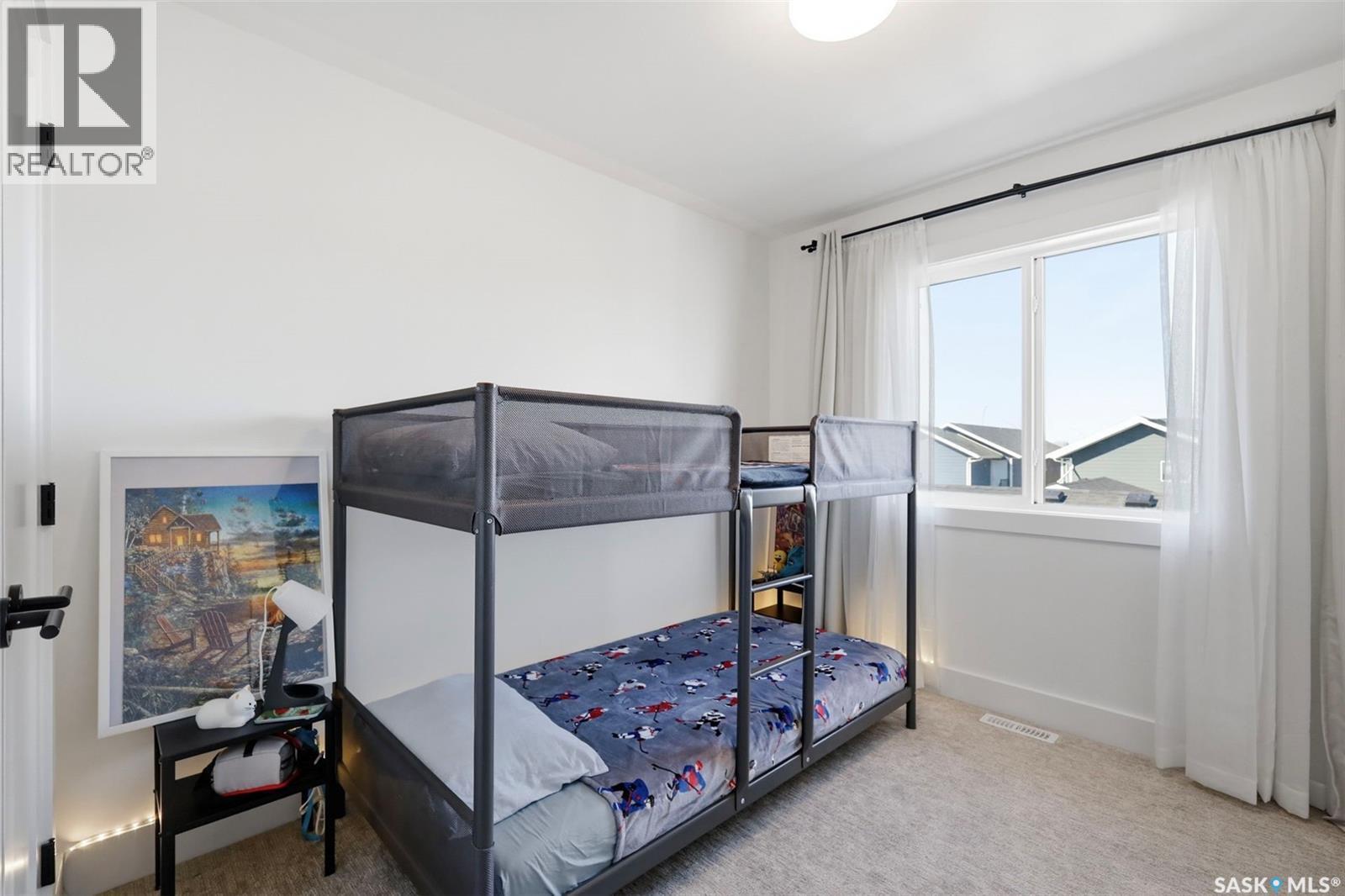 165 Rosewood Boulevard E, Saskatoon, SK - Indoor Photo Showing Bedroom