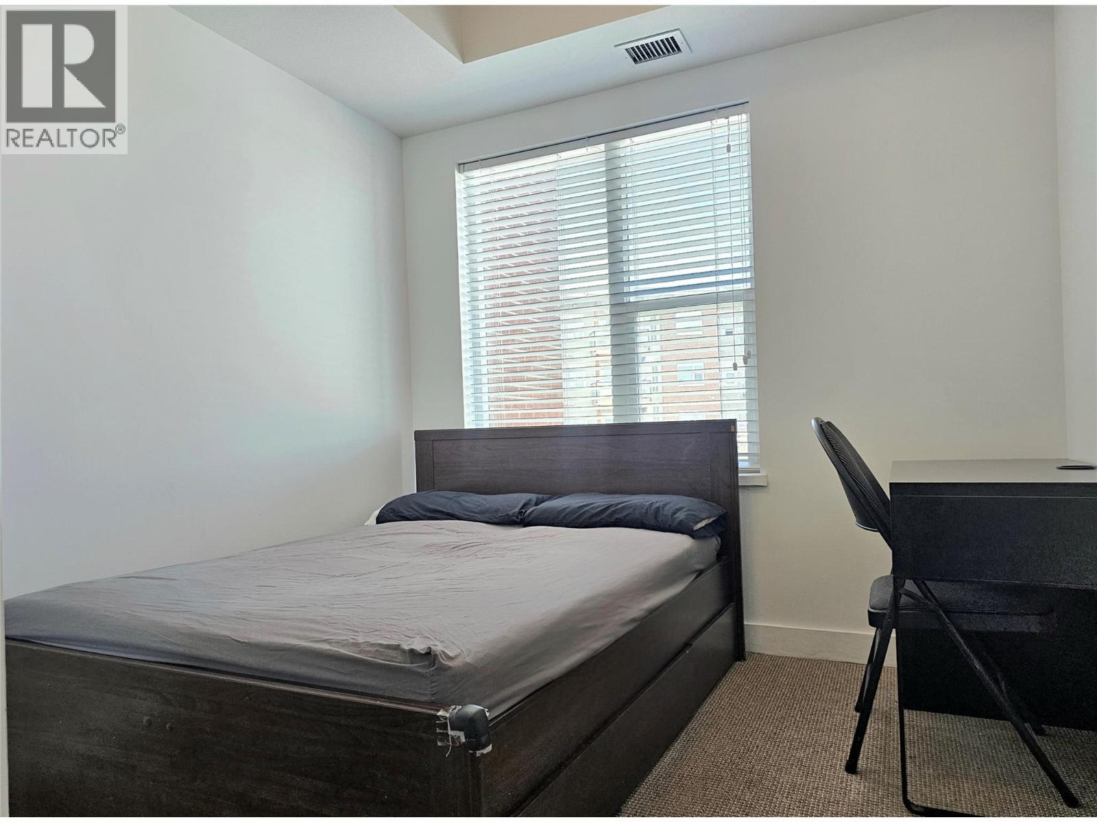 985 Academy Way Unit# 310, Kelowna, BC - Indoor Photo Showing Bedroom