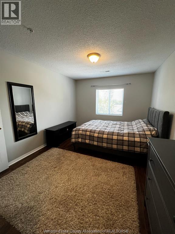 3160 Wildwood Unit# 320, Windsor, ON - Indoor Photo Showing Bedroom