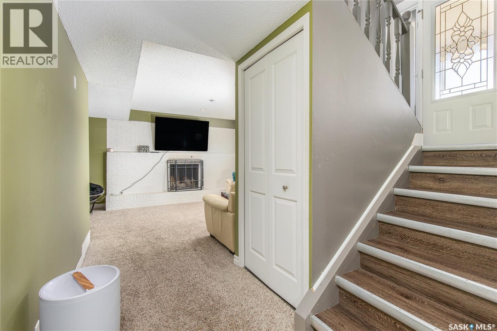 1267 Maybery Crescent, Moose Jaw, SK - Indoor Photo Showing Other Room With Fireplace