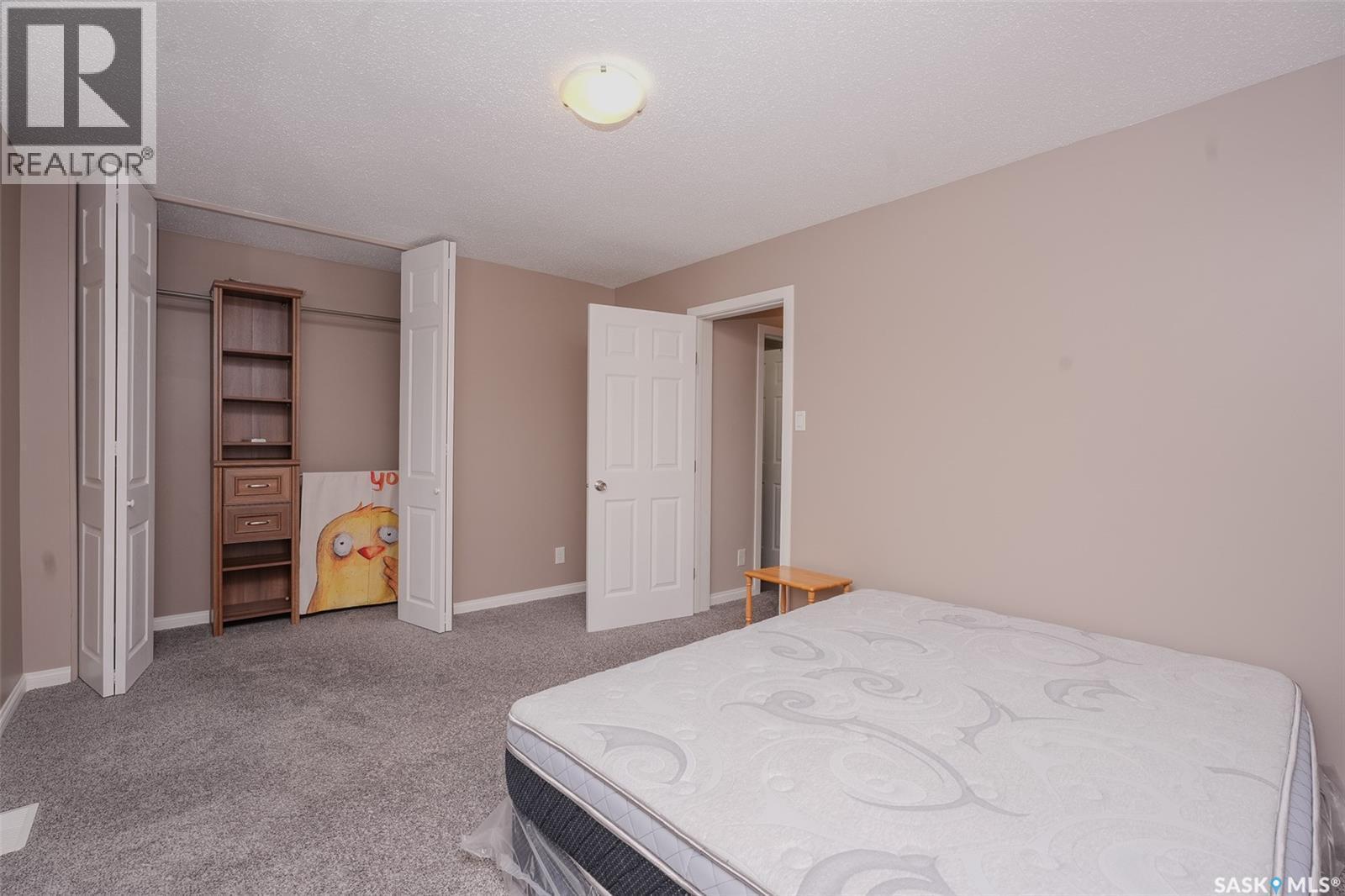 91 Mackenzie Way, Regina, SK - Indoor Photo Showing Bedroom