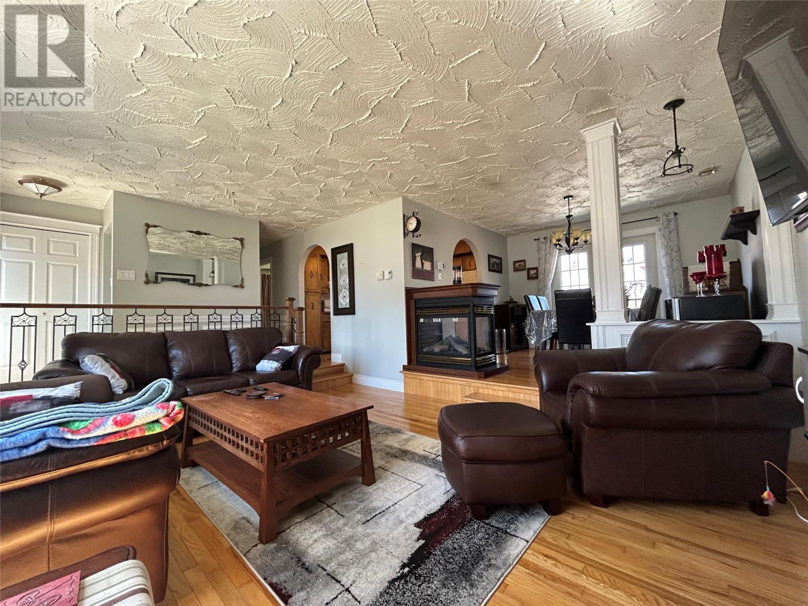 58 Forest Road, Milltown, NL - Indoor Photo Showing Living Room With Fireplace