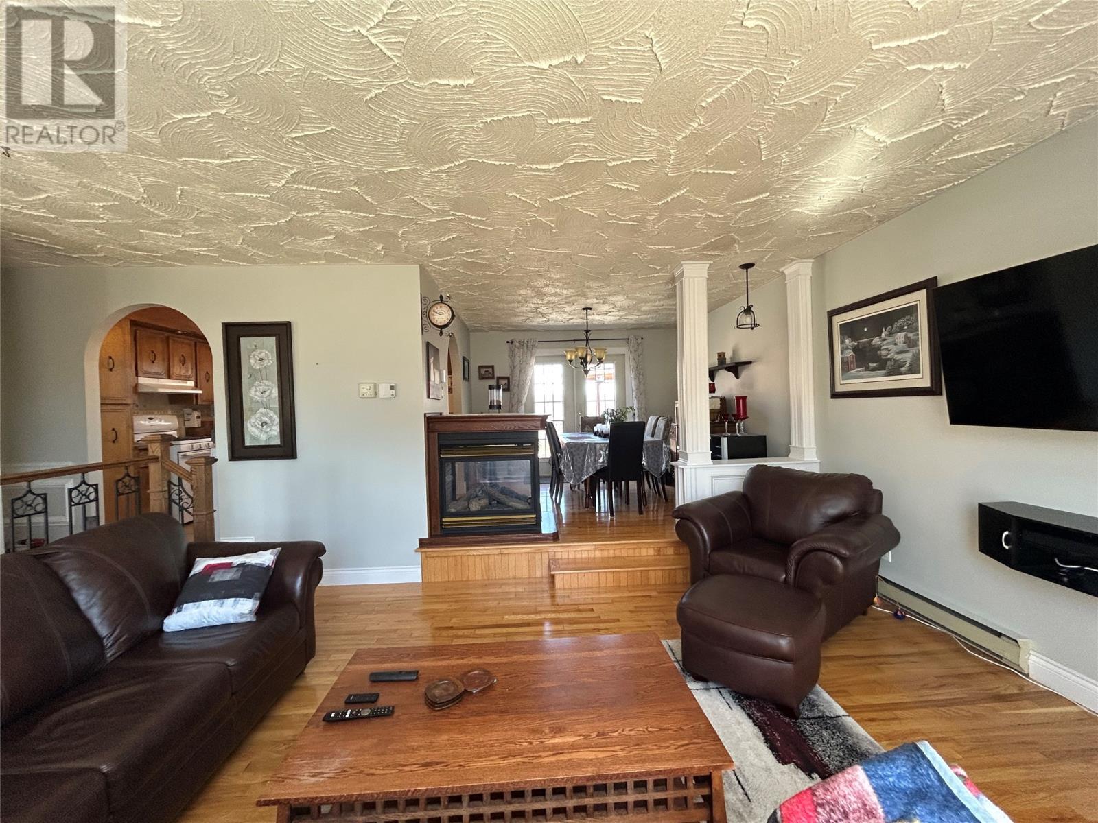 58 Forest Road, Milltown, NL - Indoor Photo Showing Living Room With Fireplace