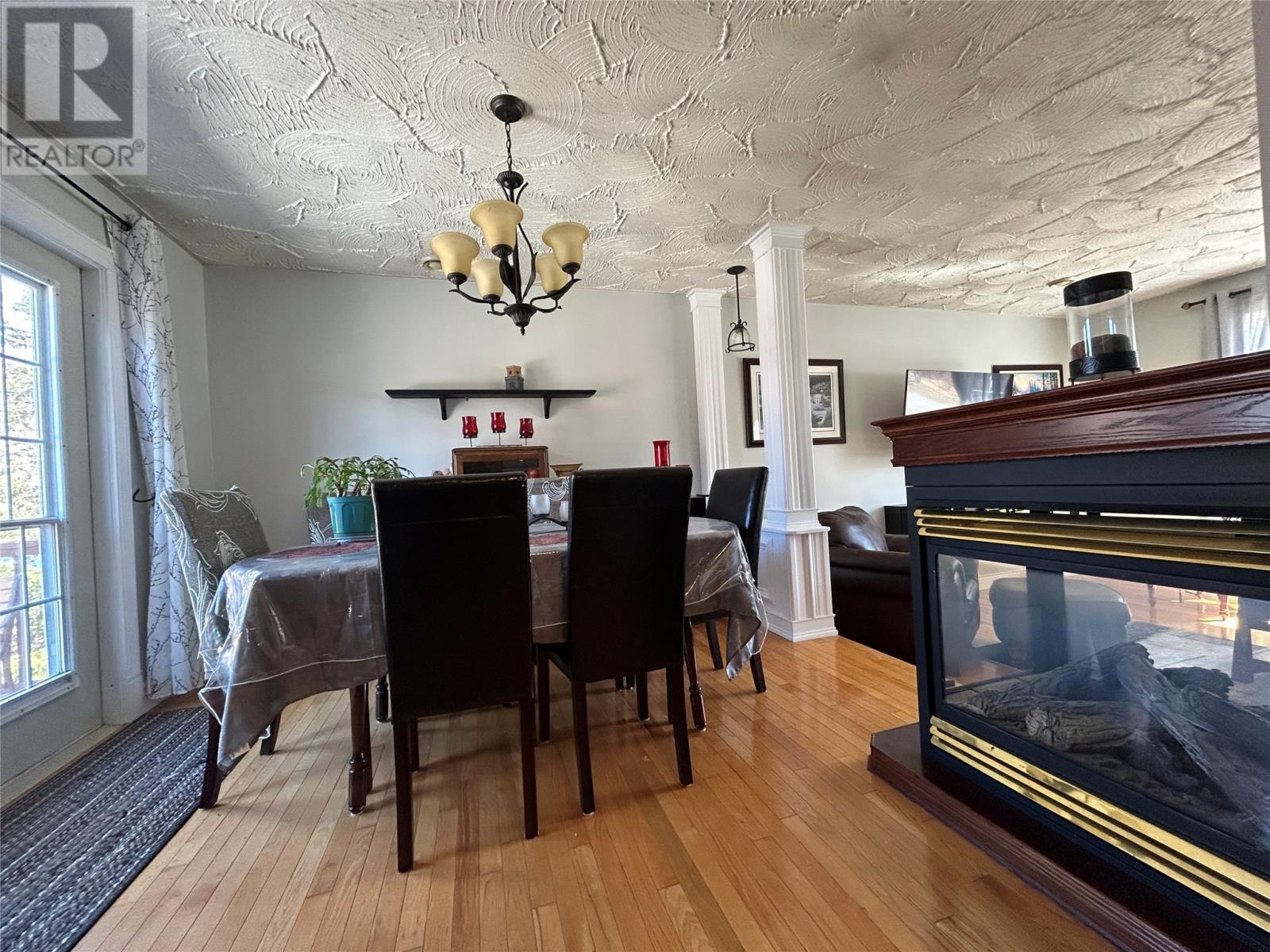58 Forest Road, Milltown, NL - Indoor Photo Showing Dining Room With Fireplace