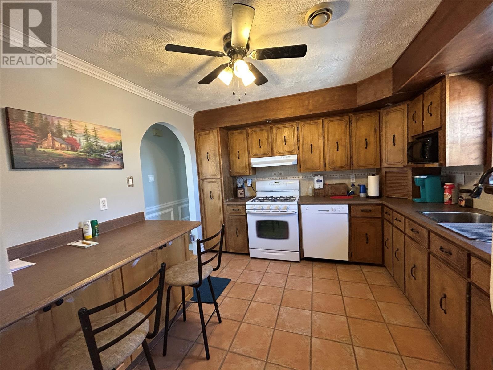 58 Forest Road, Milltown, NL - Indoor Photo Showing Kitchen With Double Sink