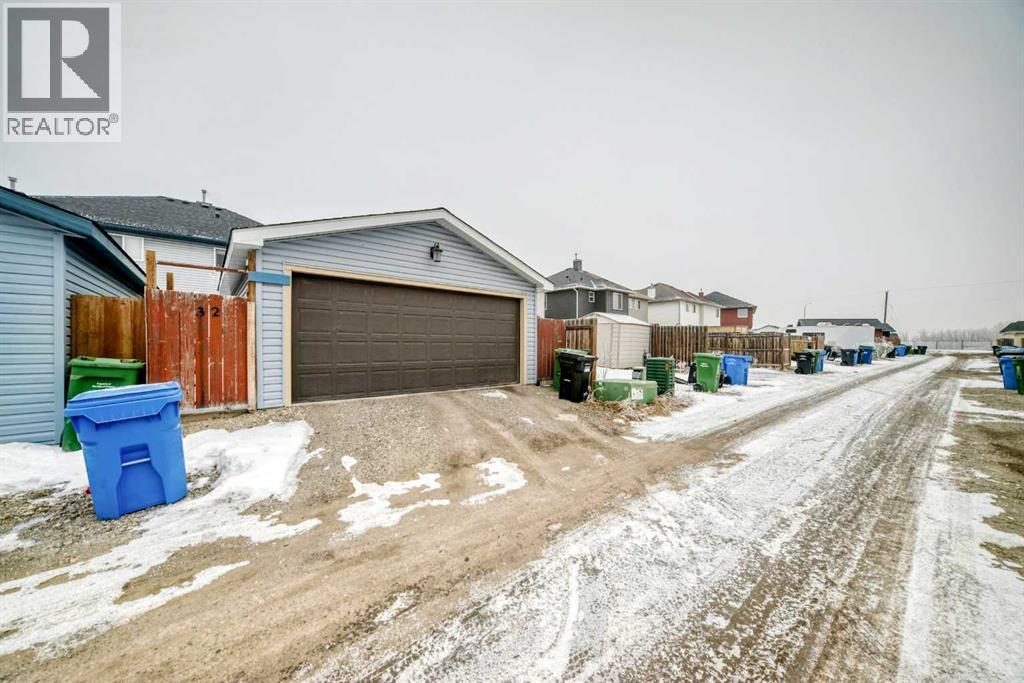 REAR BACK ALLEY - 32 Saddlebrook Place Ne, Calgary, AB - Outdoor