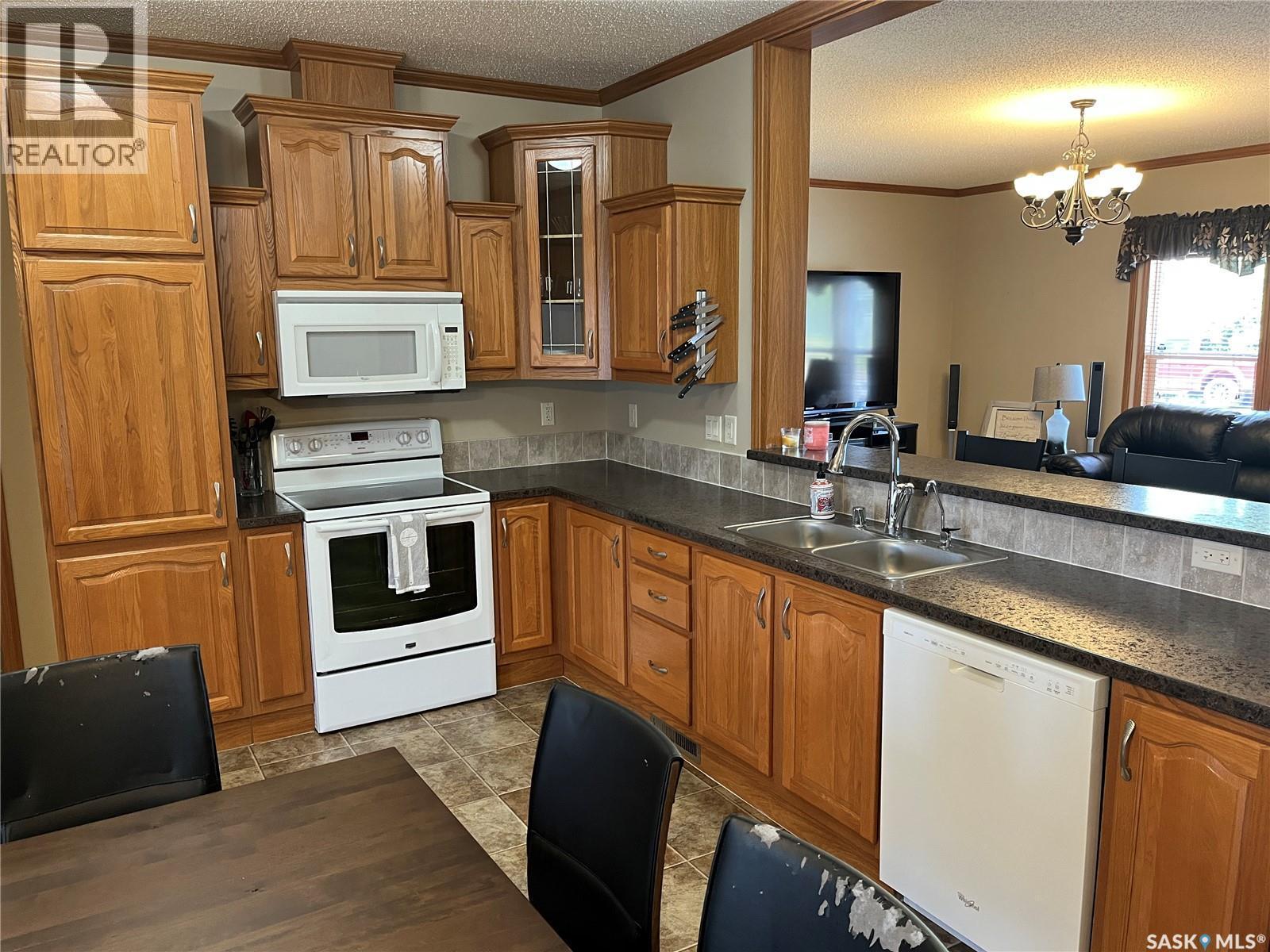 24 Hall Street, Halbrite, SK - Indoor Photo Showing Kitchen With Double Sink