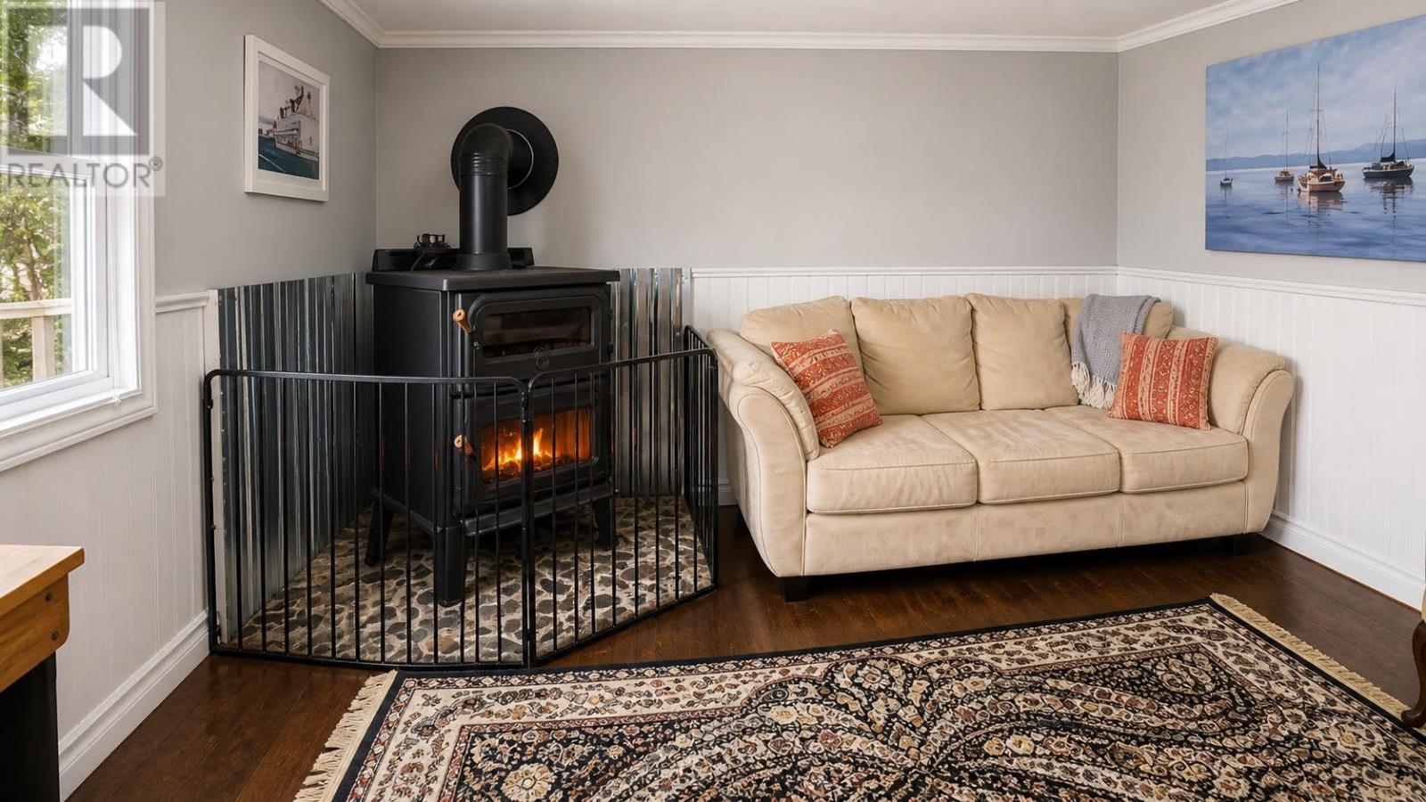 0 Main Road, Rencontre East, NL - Indoor With Fireplace