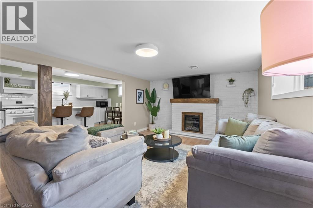 142 Marcella Crescent, Hamilton, ON - Indoor Photo Showing Living Room With Fireplace