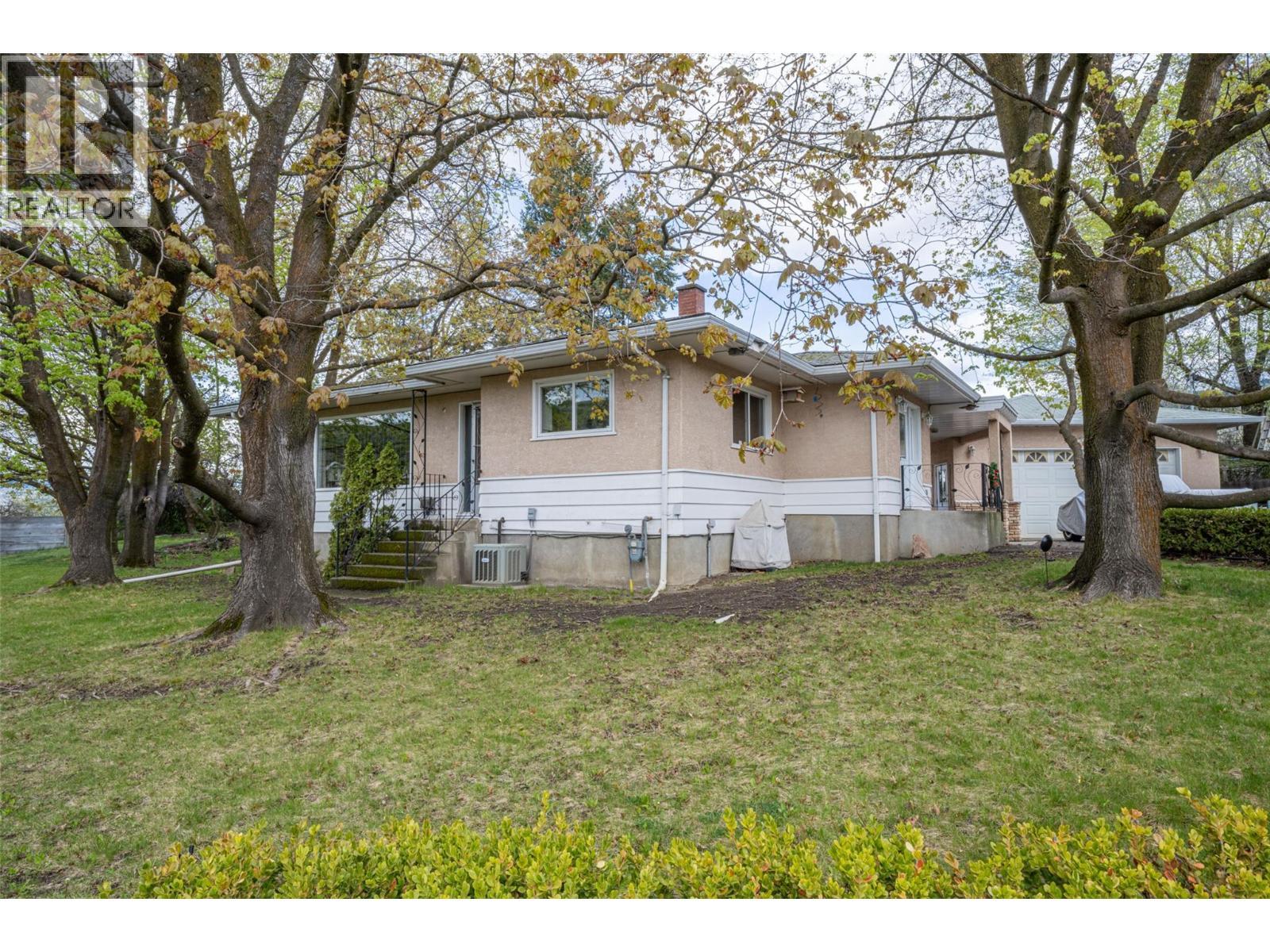 side of the house - 10003 6 Highway, Coldstream, BC