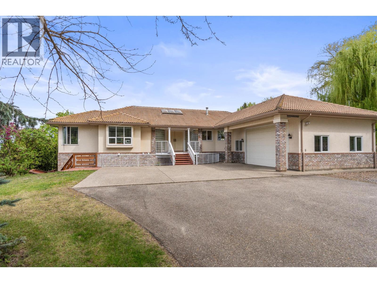 363 Northwind Drive, Vernon, BC - Outdoor With Deck Patio Veranda With Facade