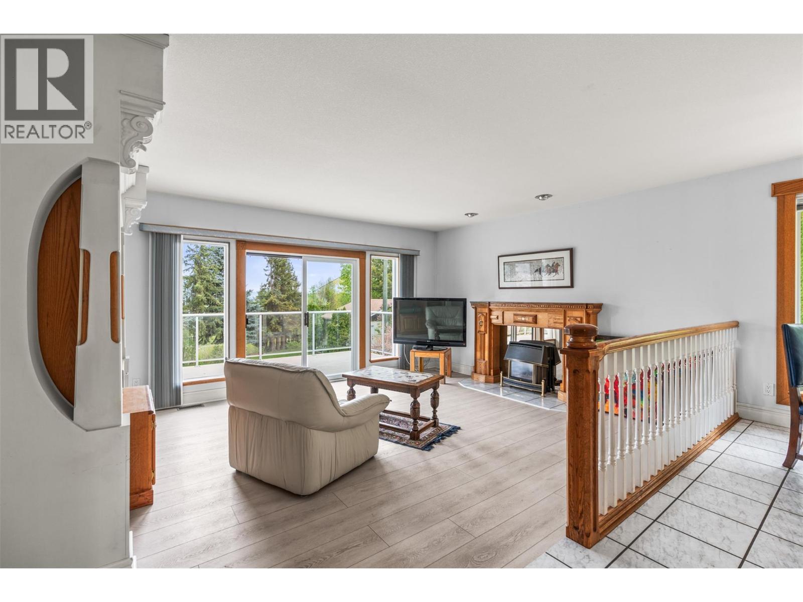 363 Northwind Drive, Vernon, BC - Indoor Photo Showing Living Room With Fireplace