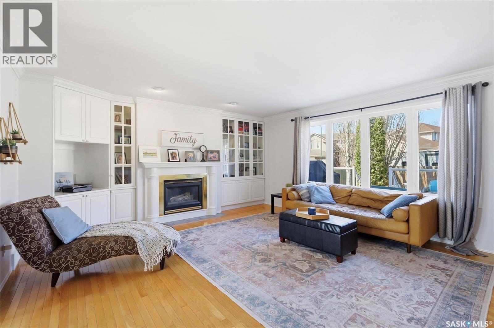 311 Guenter Crescent, Saskatoon, SK - Indoor Photo Showing Living Room With Fireplace