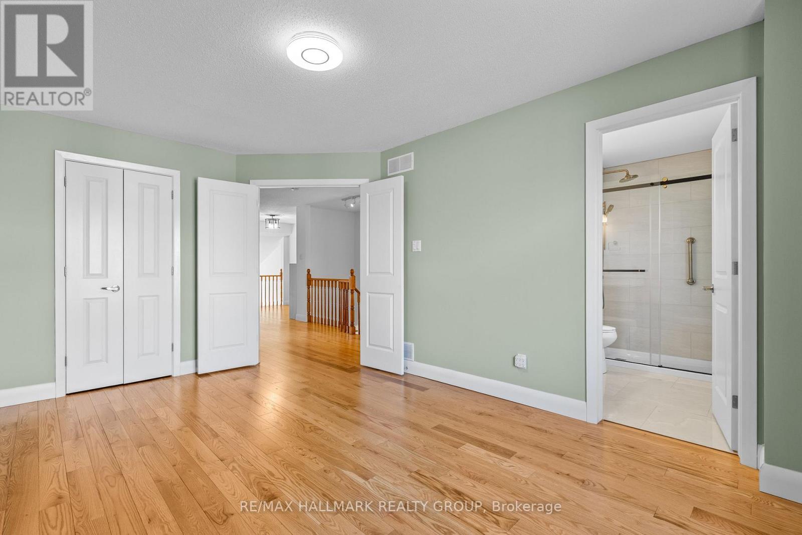Bedroom with ensuite and walk-in closet access - 988 Lucille Way, Ottawa, ON - Indoor Photo Showing Other Room