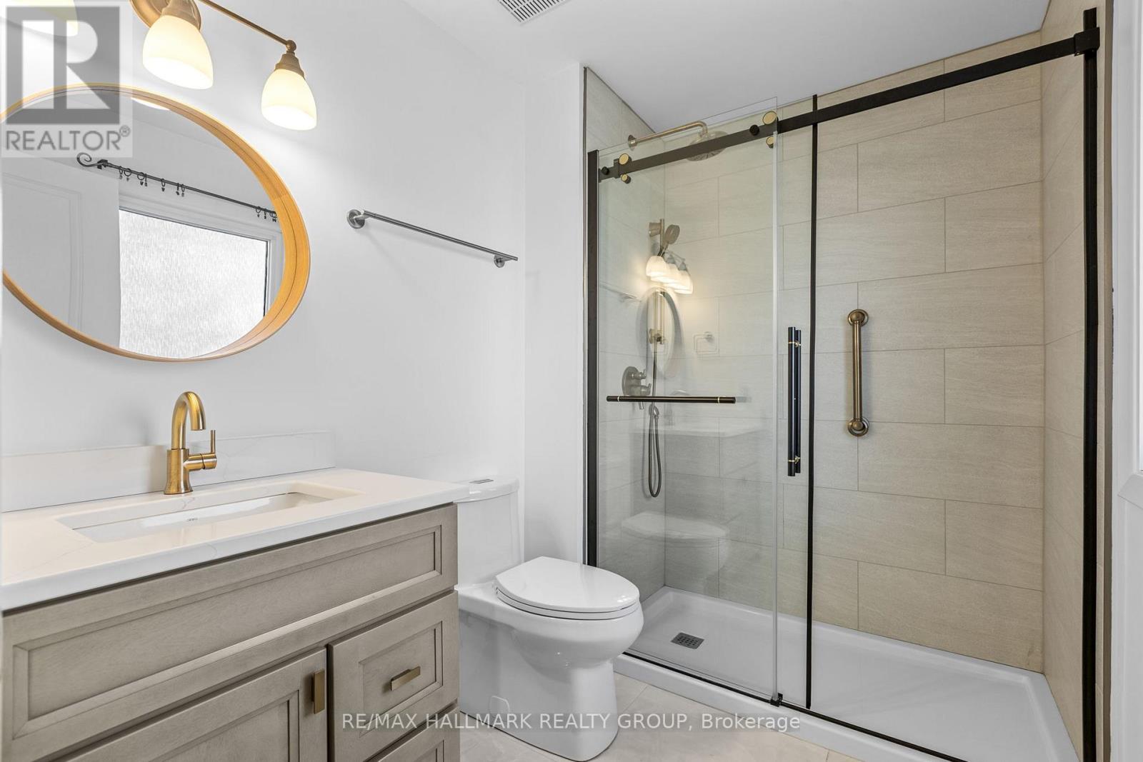 Updated ensuite with glass shower - 988 Lucille Way, Ottawa, ON - Indoor Photo Showing Bathroom