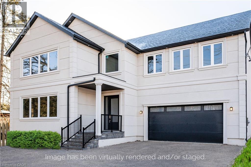 View of front of home with a garage, driveway, stucco siding, and a shingled roof - 1105 Main Street E, Cambridge, ON - Outdoor