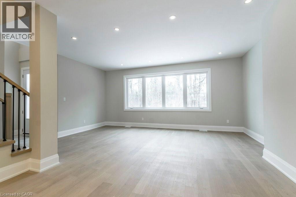 Unfurnished room featuring light wood-style floors and recessed lighting - 1105 Main Street E, Cambridge, ON - Indoor Photo Showing Other Room
