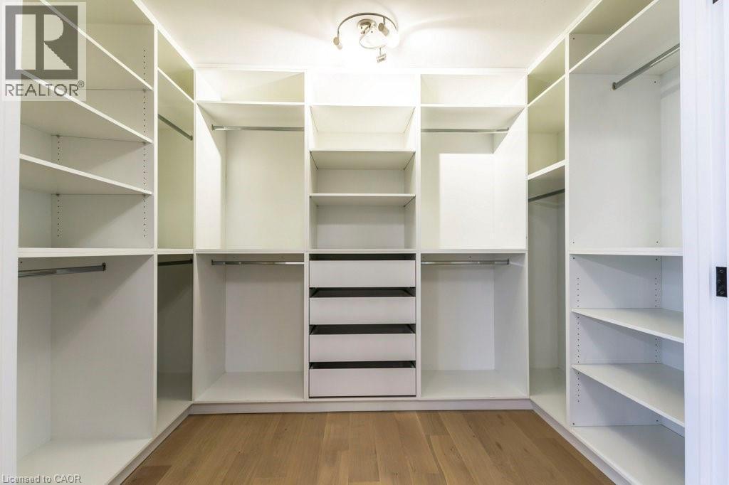 Walk in closet with light wood-style flooring - 1105 Main Street E, Cambridge, ON - Indoor With Storage