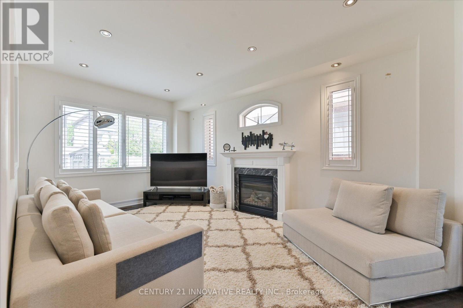 92 Riverwalk Drive, Markham, ON - Indoor Photo Showing Living Room With Fireplace