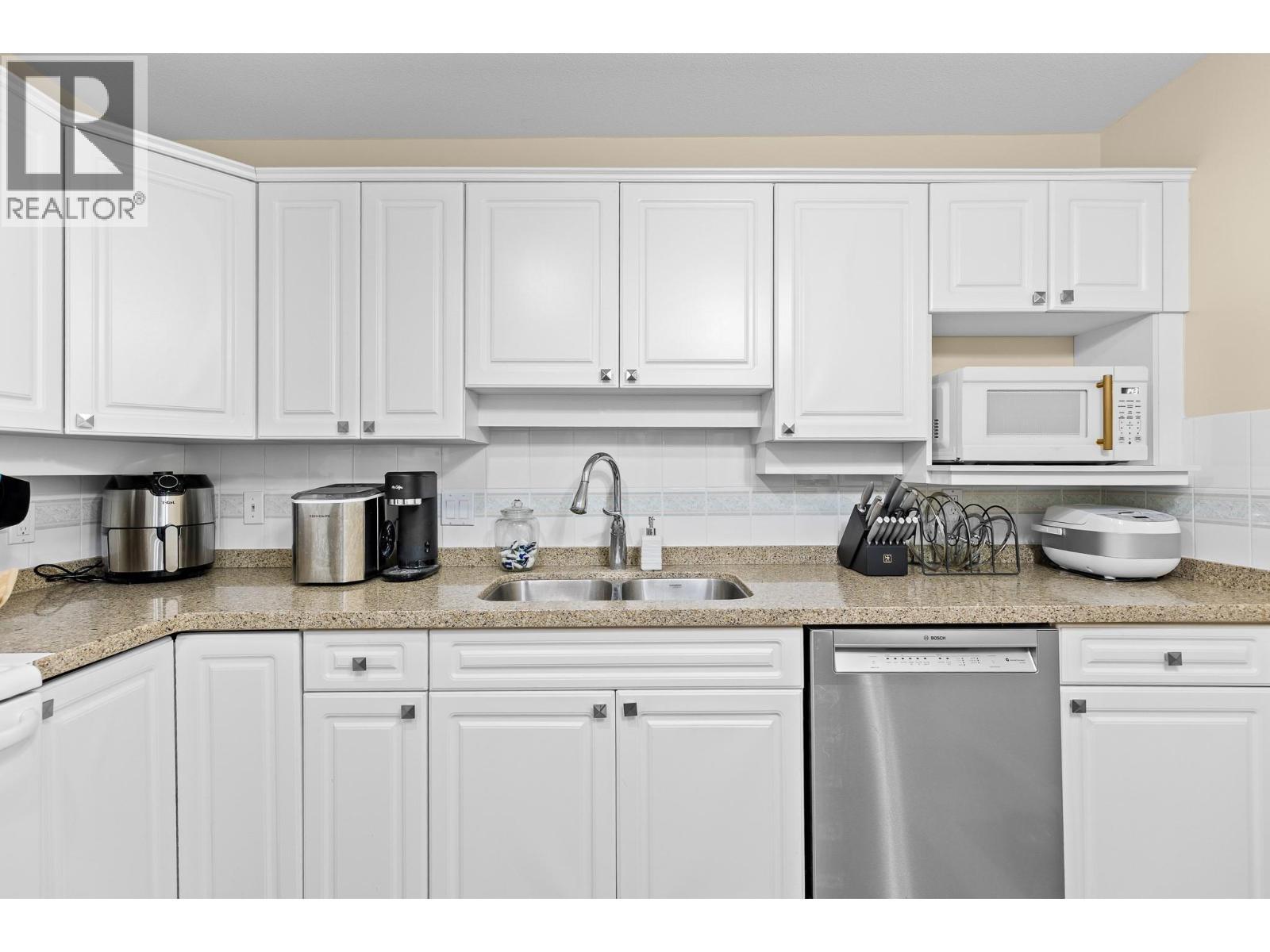 3300 Centennial Drive Unit# 204, Vernon, BC - Indoor Photo Showing Kitchen With Double Sink