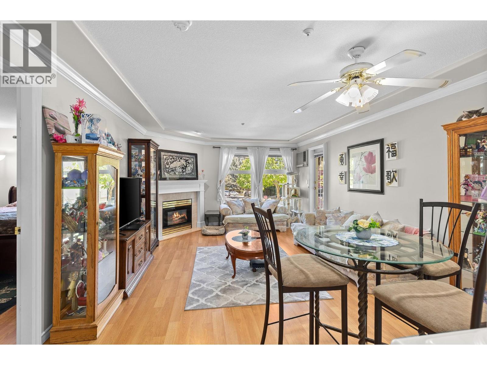 3300 Centennial Drive Unit# 204, Vernon, BC - Indoor Photo Showing Dining Room With Fireplace