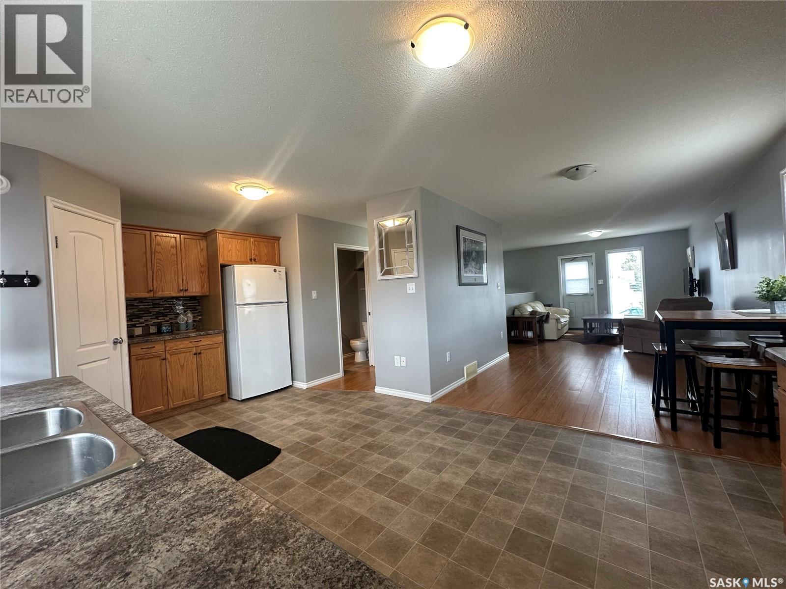 46 Clarke Avenue, Yorkton, SK - Indoor Photo Showing Kitchen With Double Sink