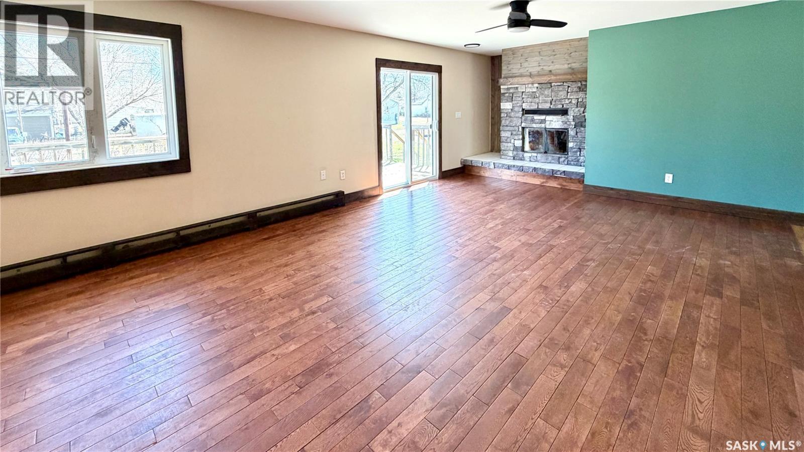 205 Conquest Street, Conquest, SK - Indoor With Fireplace