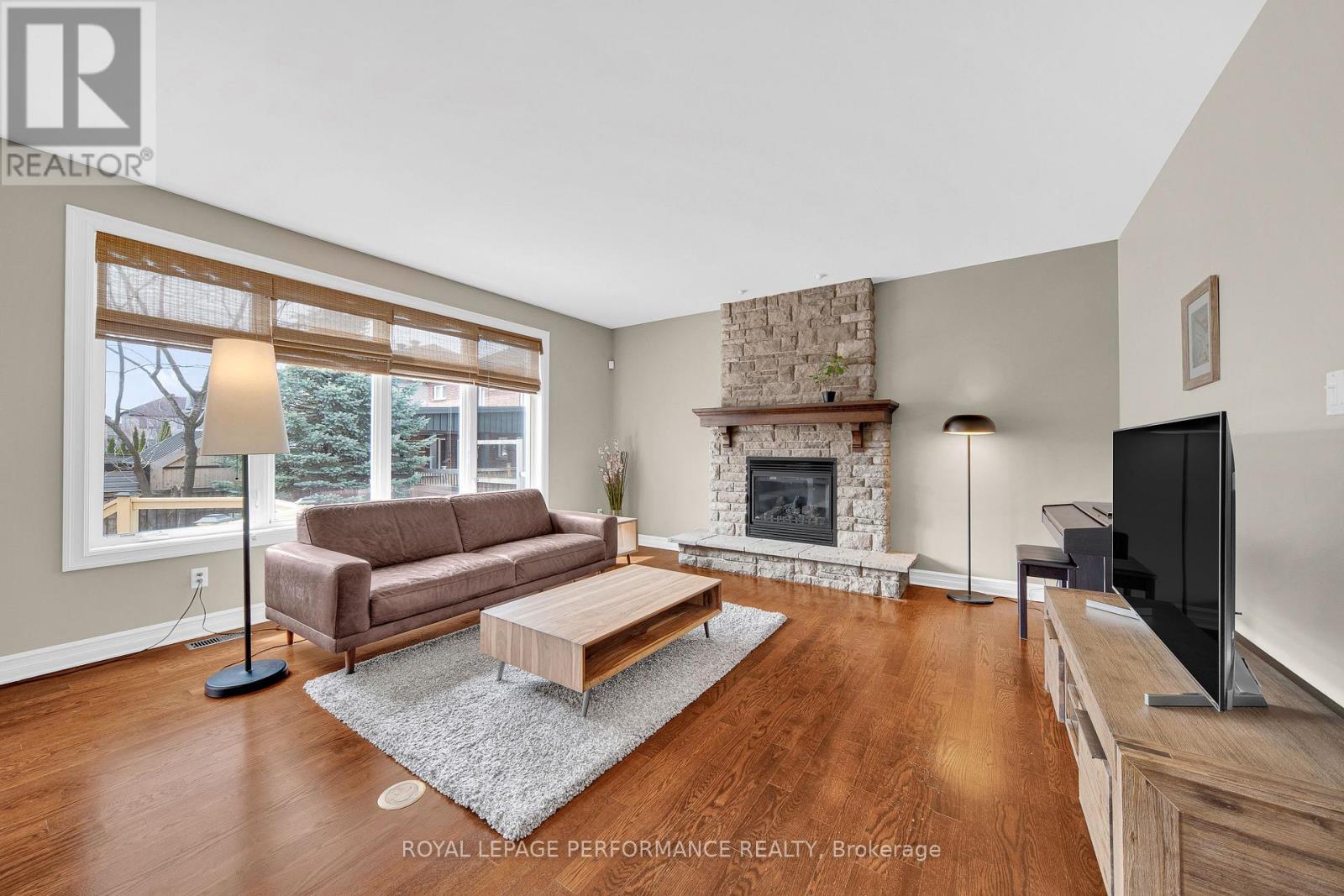 590 Kochar Drive, Ottawa, ON - Indoor Photo Showing Living Room With Fireplace
