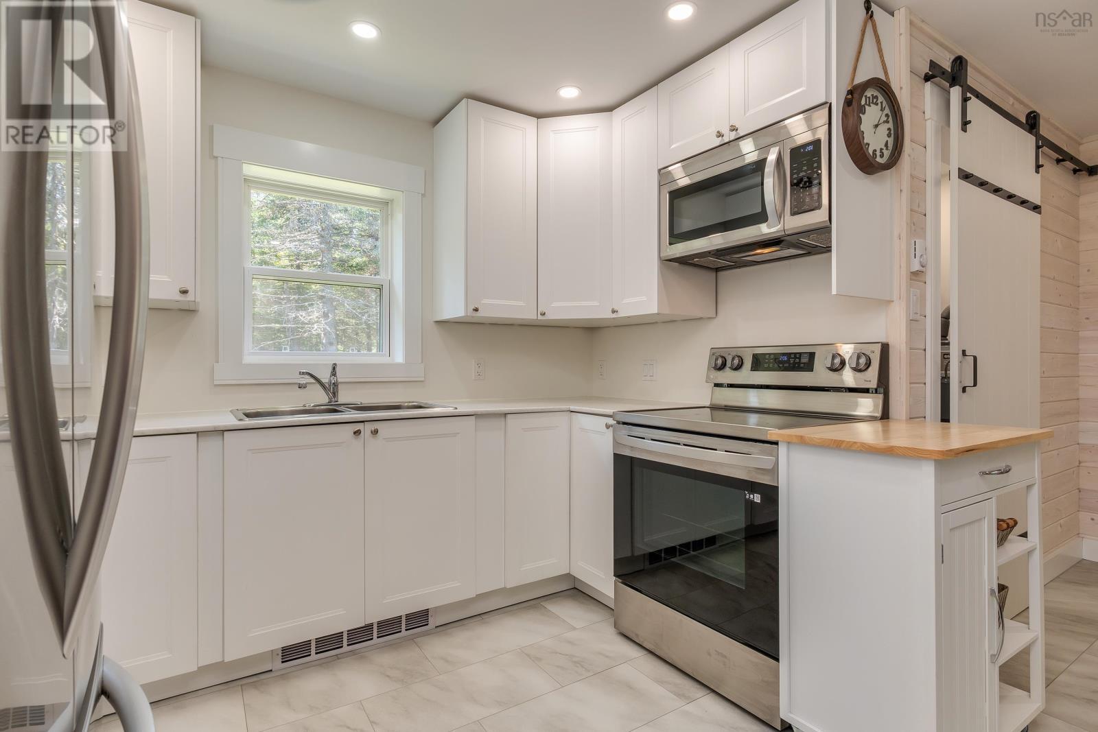 20 Howard Stevens Walk, Clam Harbour, NS - Indoor Photo Showing Kitchen With Double Sink
