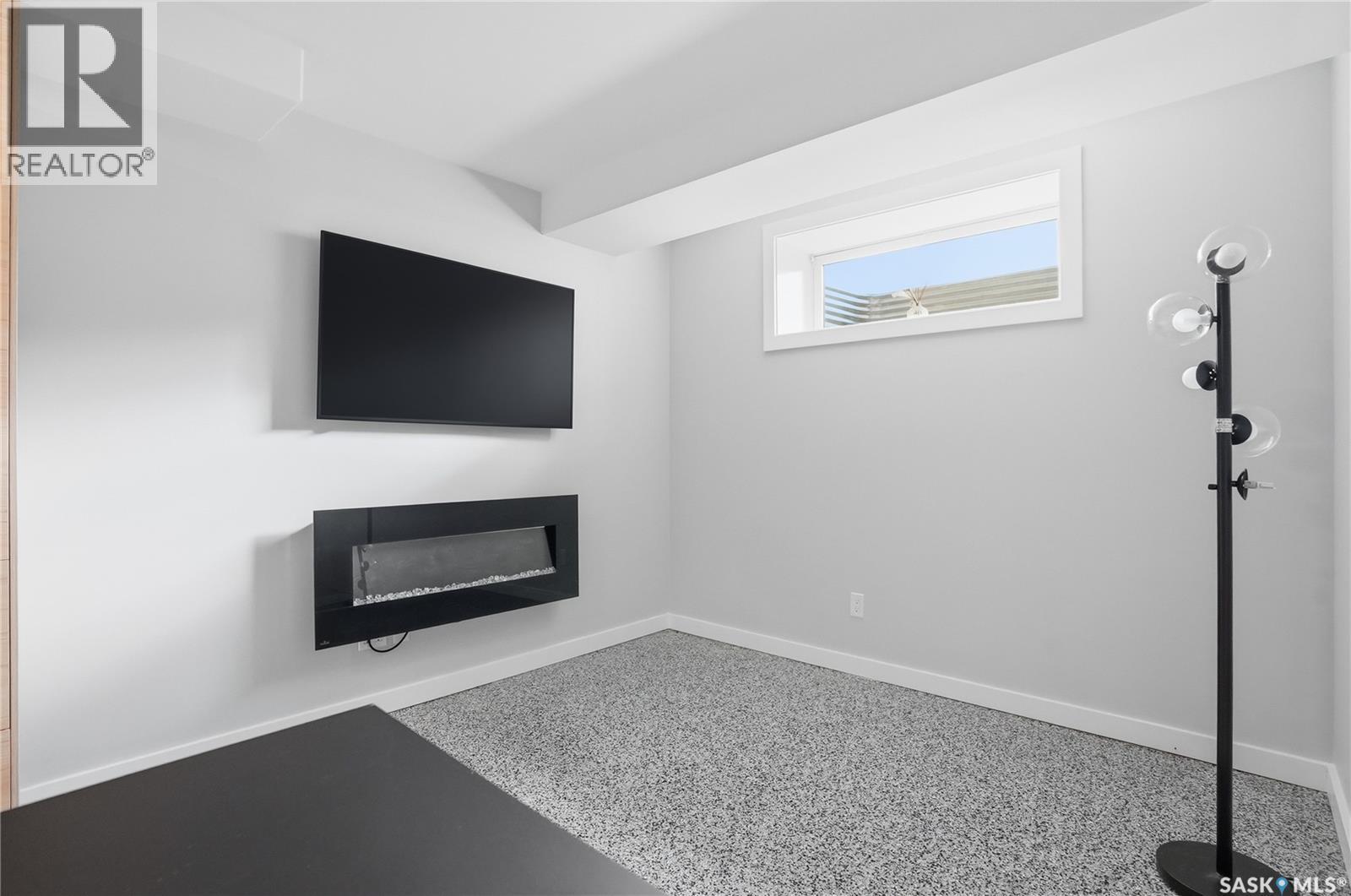 246 Aniskotaw Manor, Saskatoon, SK - Indoor With Fireplace