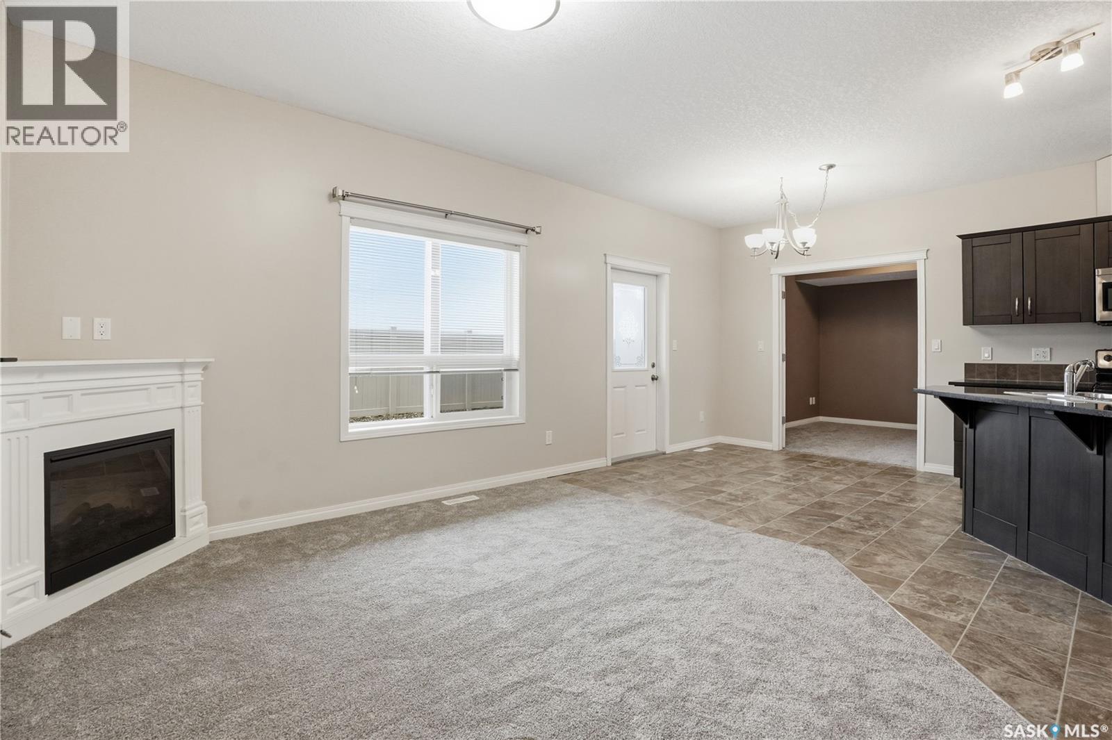 210 3818 Dewdney Avenue E, Regina, SK - Indoor With Fireplace
