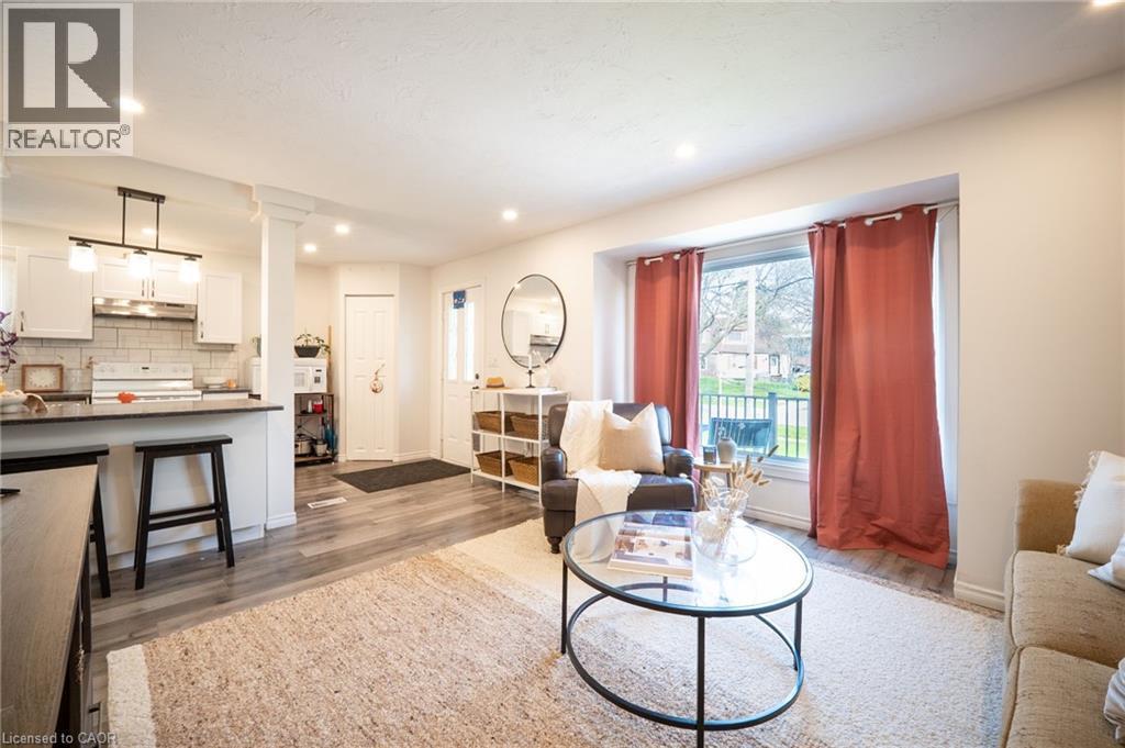 18 Armstrong Avenue, Hamilton, ON - Indoor Photo Showing Living Room