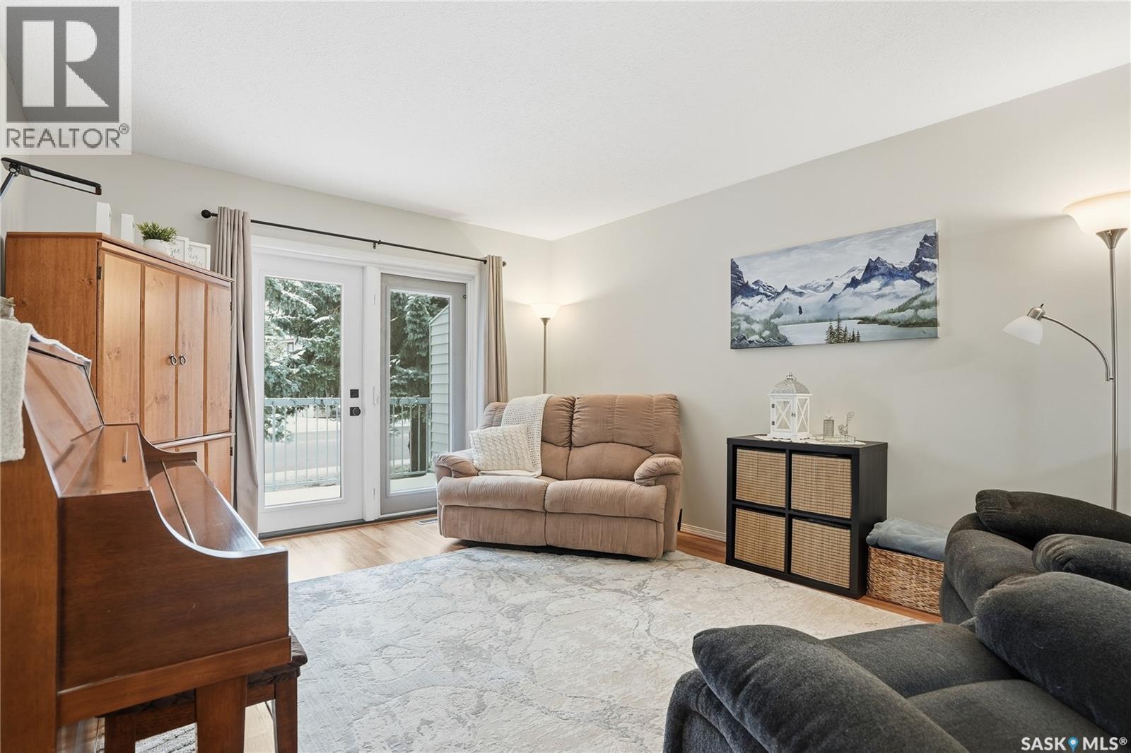 12 80 Berini Drive, Saskatoon, SK - Indoor Photo Showing Living Room
