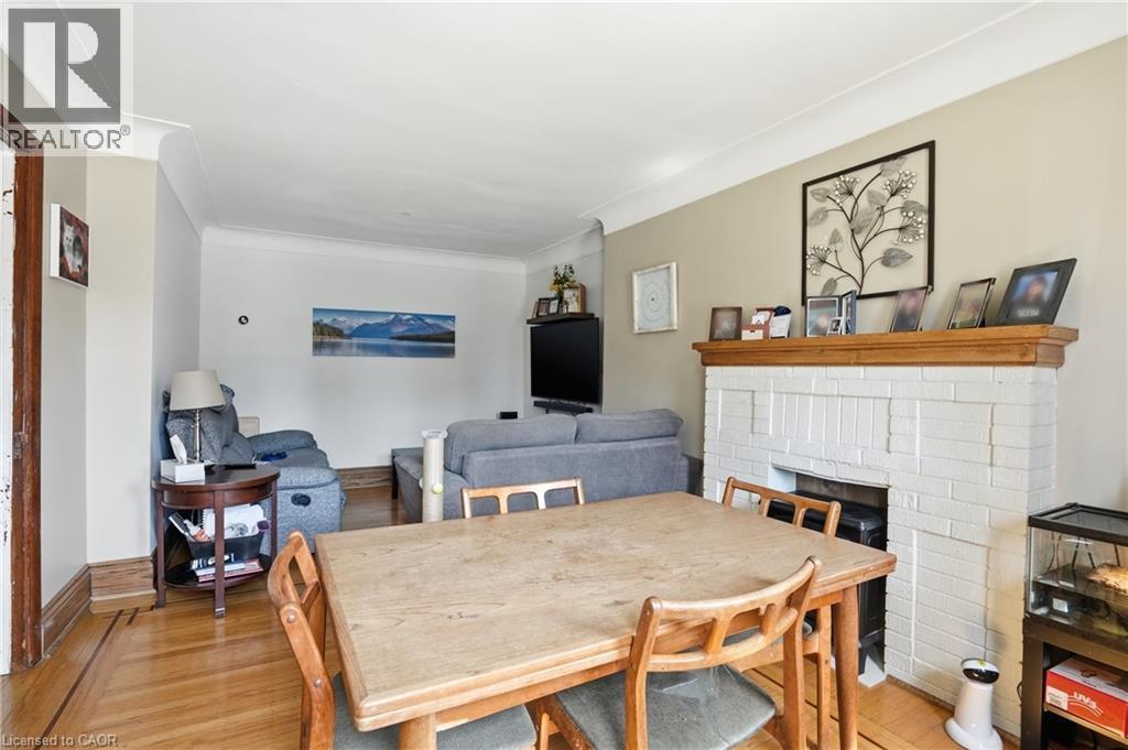 21 Weir Street N, Hamilton, ON - Indoor Photo Showing Dining Room With Fireplace