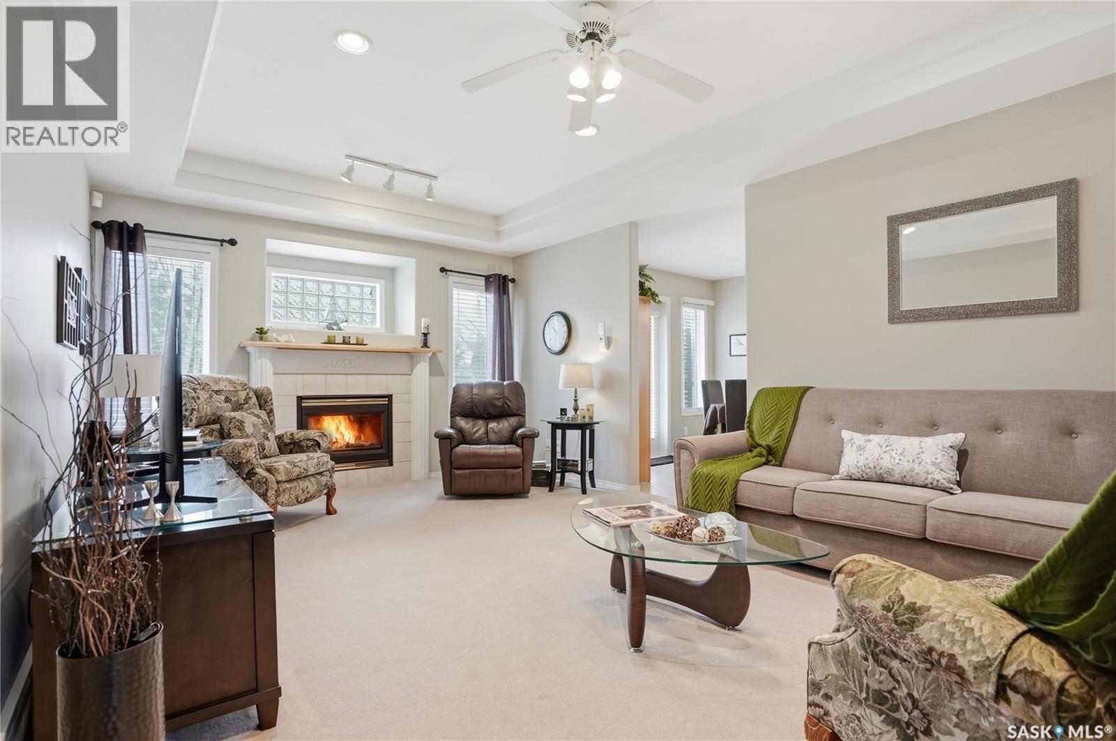 911 Chotem Crescent, Saskatoon, SK - Indoor Photo Showing Living Room With Fireplace