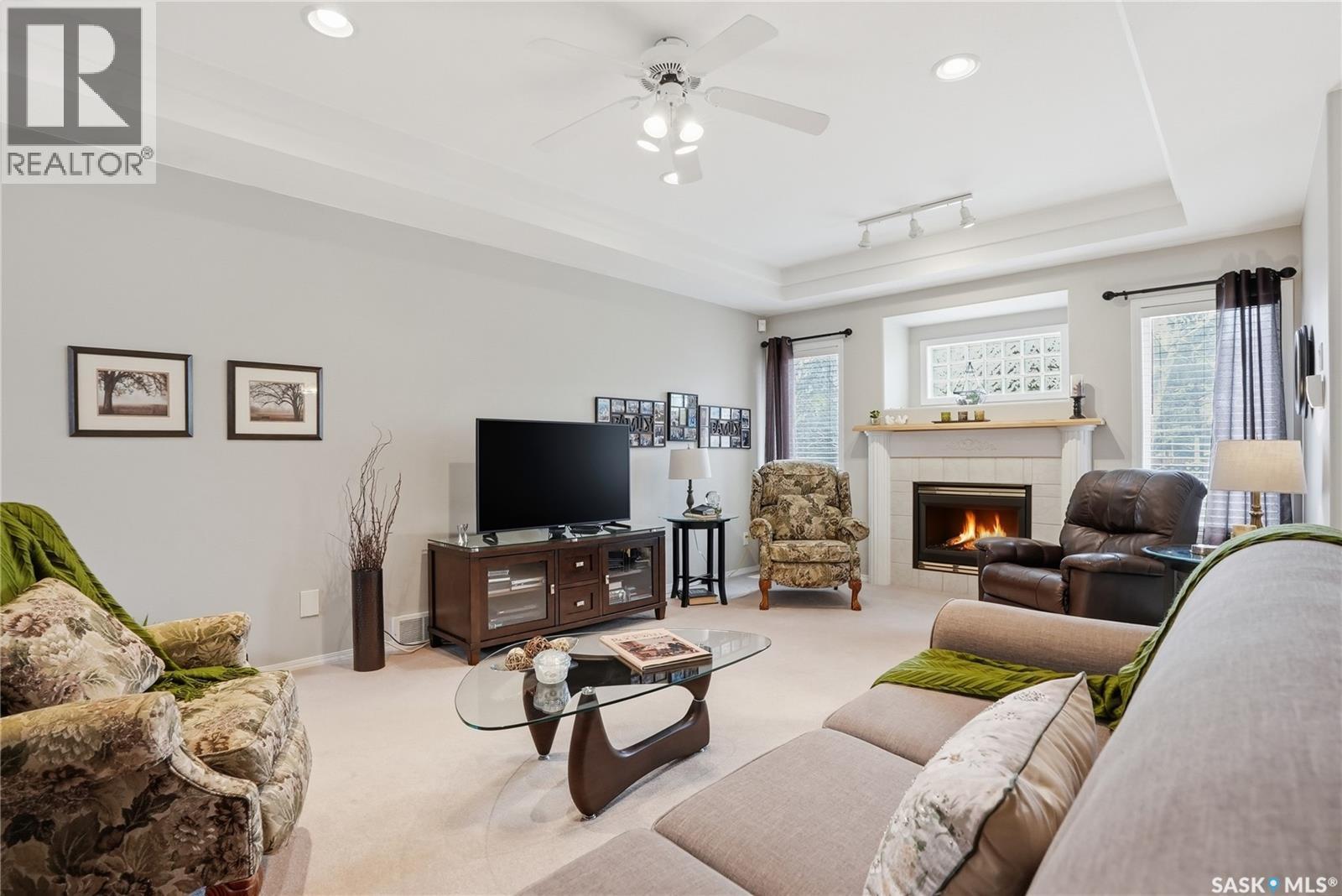 911 Chotem Crescent, Saskatoon, SK - Indoor Photo Showing Living Room With Fireplace
