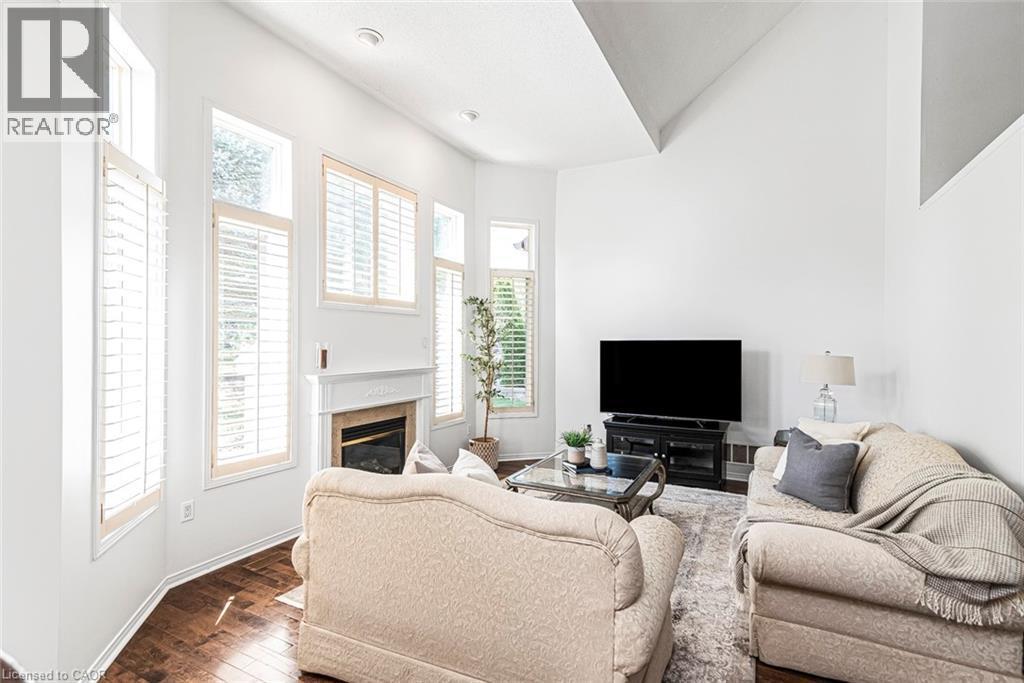 102 Moore Crescent, Ancaster, ON - Indoor Photo Showing Living Room With Fireplace