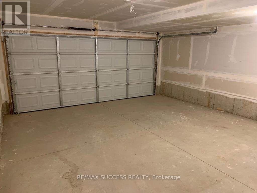 80 Progress Crescent, Kitchener, ON - Indoor Photo Showing Garage