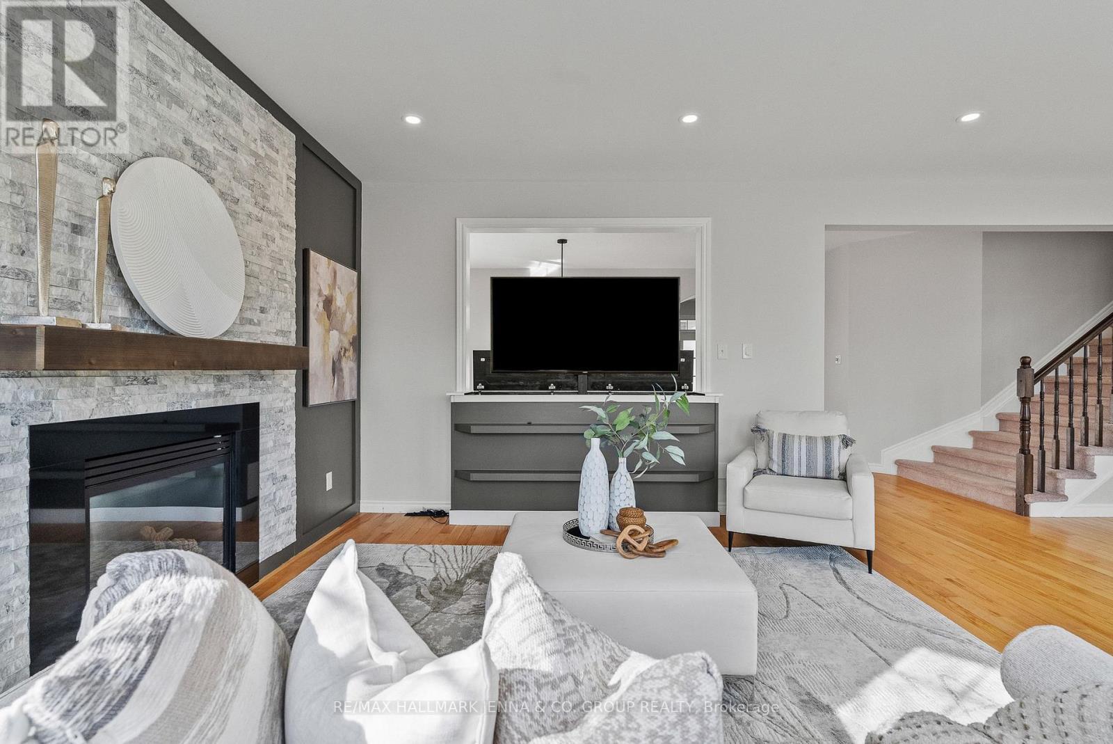 2649 Fallingwater Circle, Ottawa, ON - Indoor Photo Showing Living Room With Fireplace