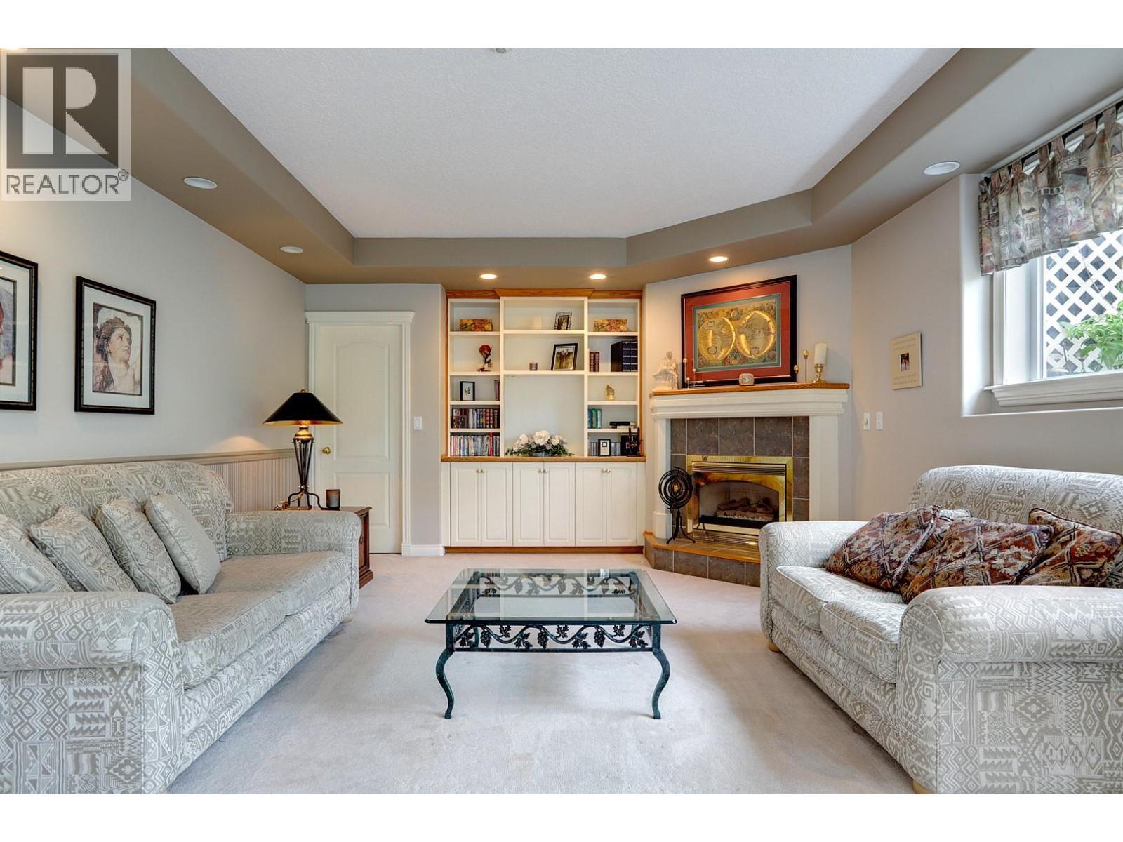 1101 Phoenix Drive, Vernon, BC - Indoor Photo Showing Living Room With Fireplace