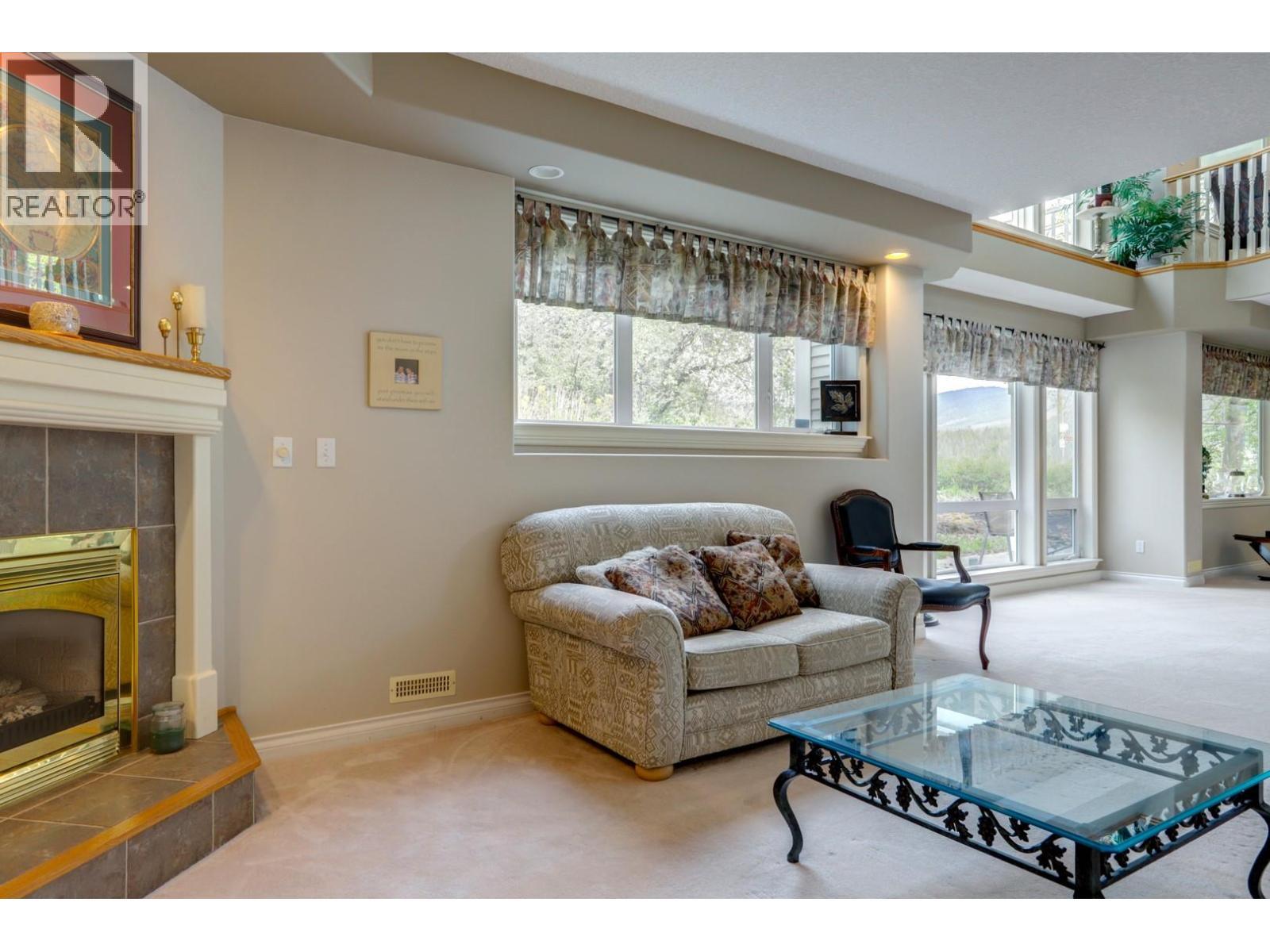 1101 Phoenix Drive, Vernon, BC - Indoor Photo Showing Living Room With Fireplace