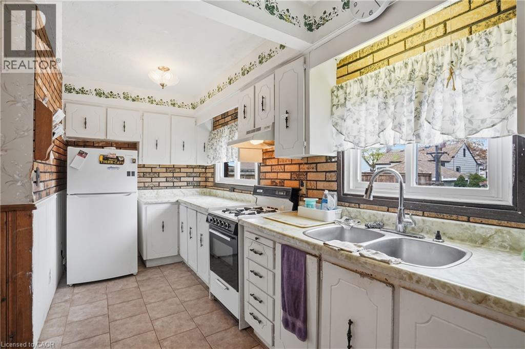 105 Tolton Avenue, Hamilton, ON - Indoor Photo Showing Kitchen With Double Sink