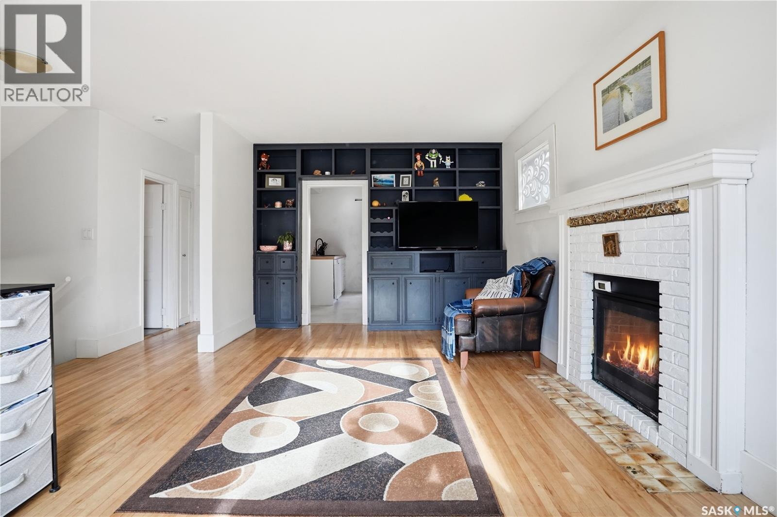 2543 Garnet Street, Regina, SK - Indoor Photo Showing Living Room With Fireplace